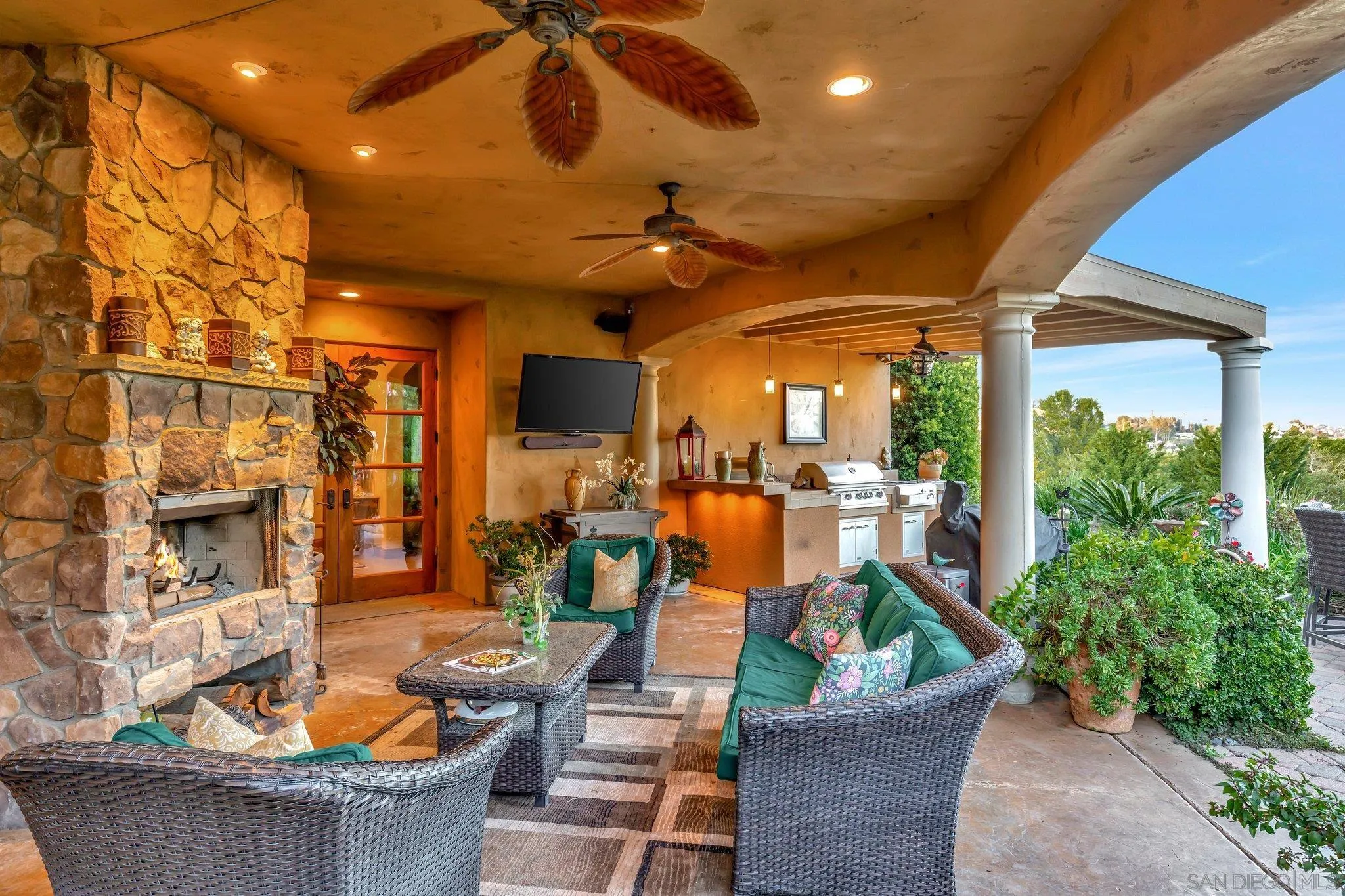 3401 Preakness Court Fallbrook, CA 92028 - Photo 11 of 52 a living room with patio furniture and a potted plant