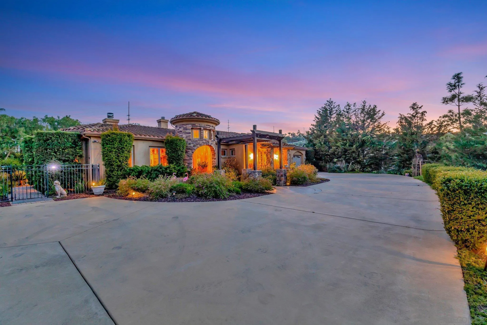 3401 Preakness Court Fallbrook, CA 92028 - Photo 2 of 52 a front view of a house with a yard and a garage