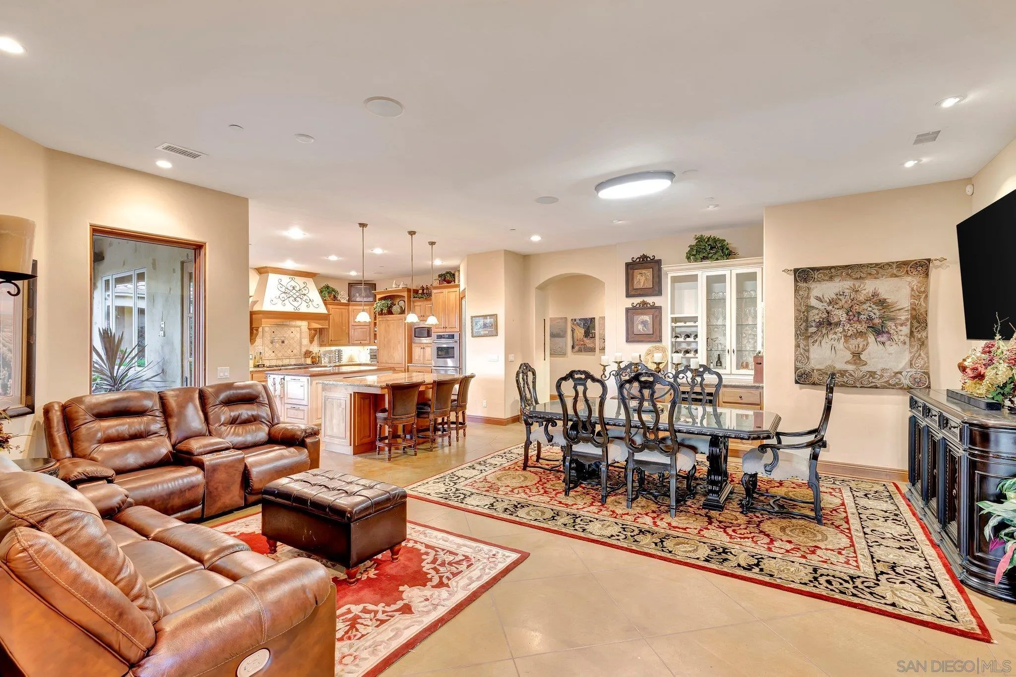3401 Preakness Court Fallbrook, CA 92028 - Photo 25 of 52 a living room with furniture kitchen view and a large window