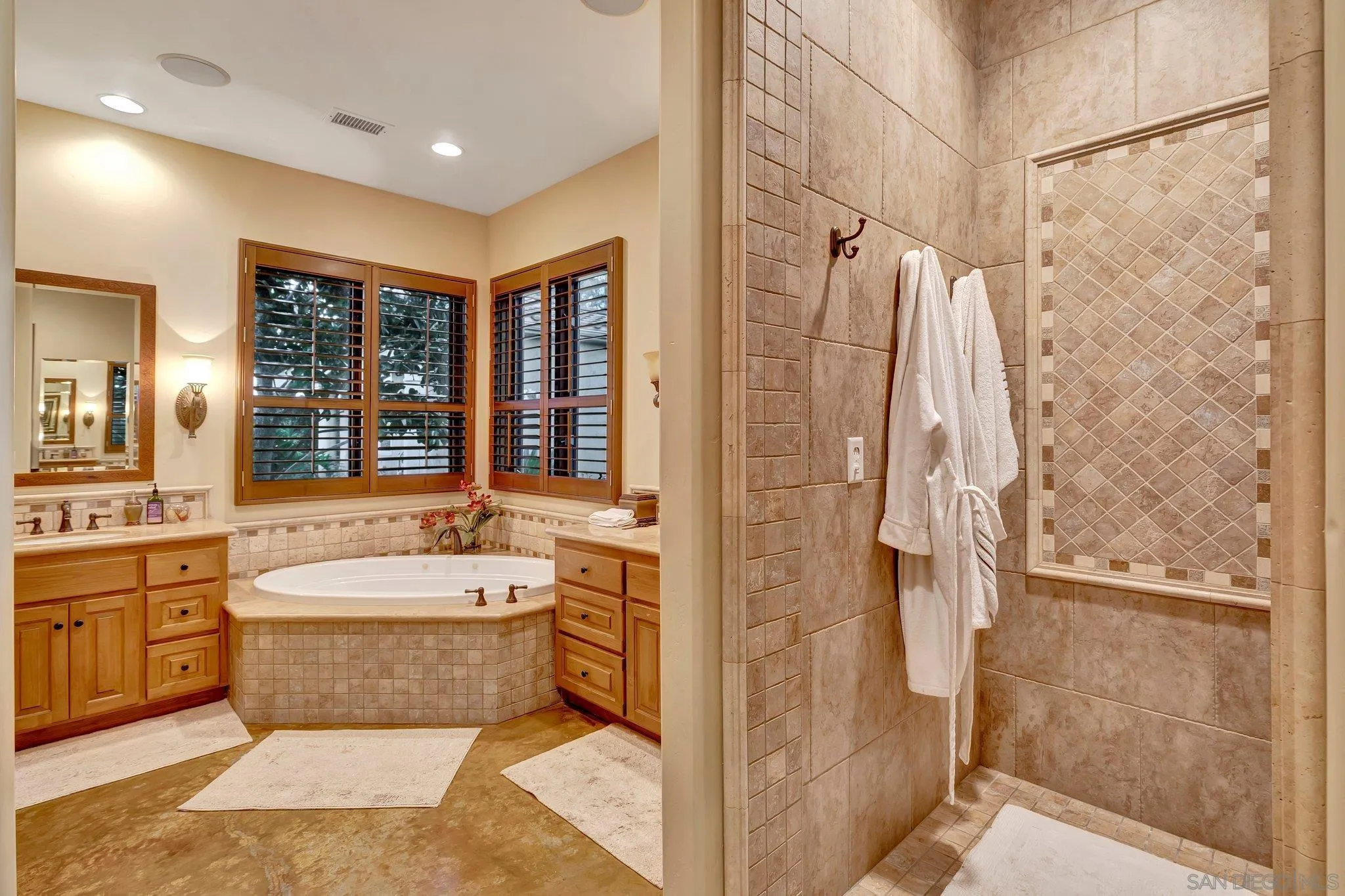 3401 Preakness Court Fallbrook, CA 92028 - Photo 36 of 52 a spacious bathroom with a bathtub sink shower and mirror
