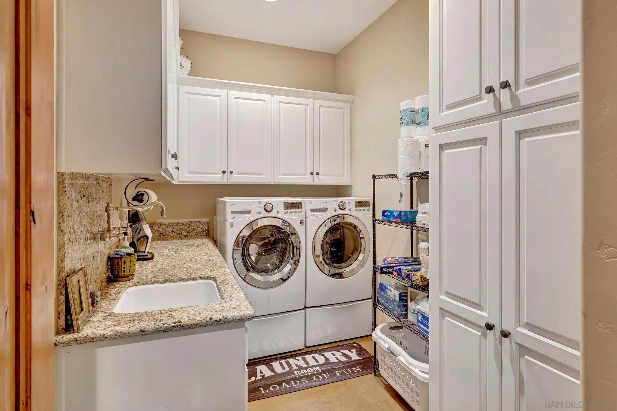 3401 Preakness Court Fallbrook, CA 92028 - Photo 45 of 52 a utility room with sink dryer and washer