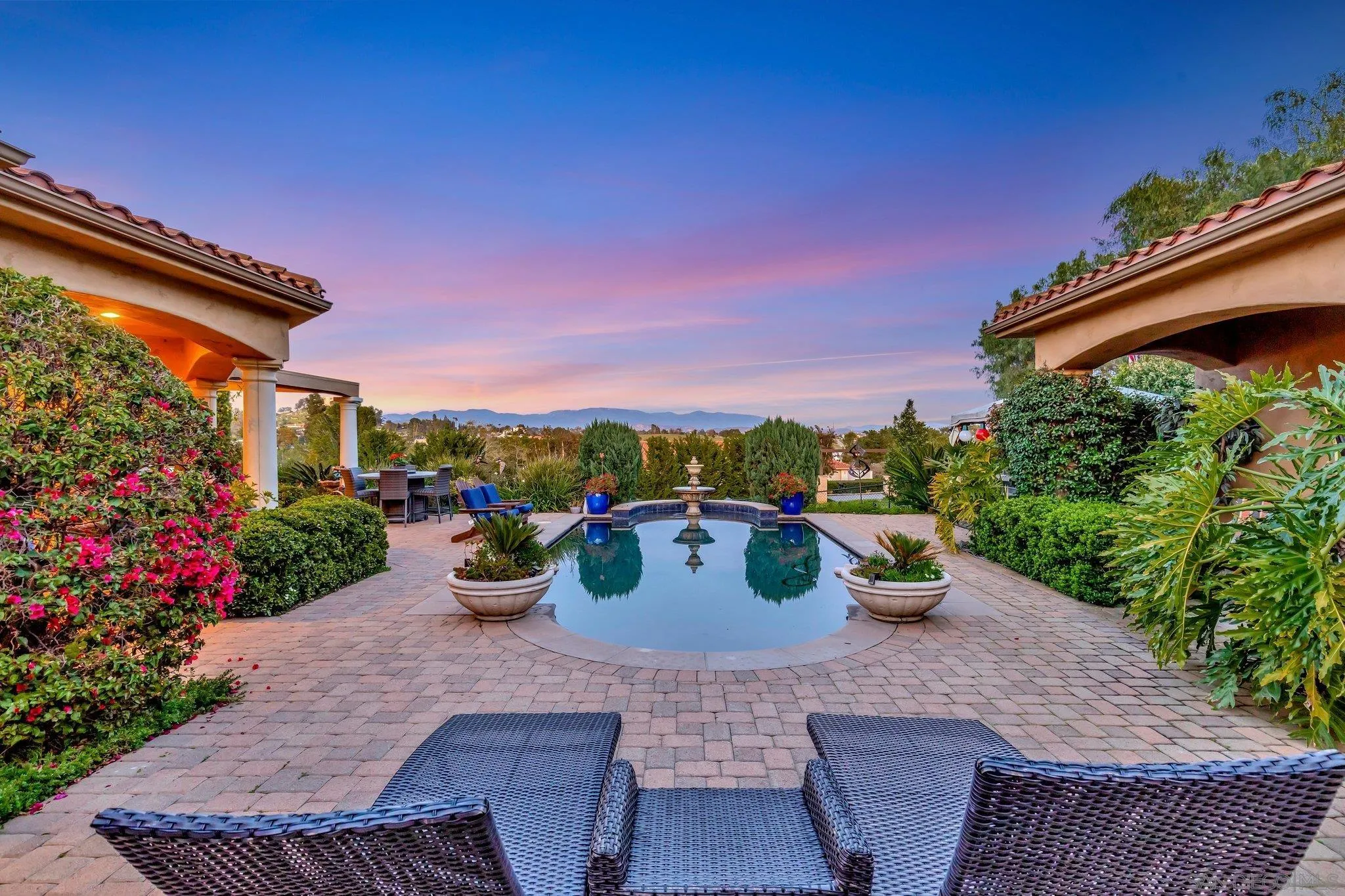3401 Preakness Court Fallbrook, CA 92028 - Photo 6 of 52 a view of a backyard with sitting area and potted plants