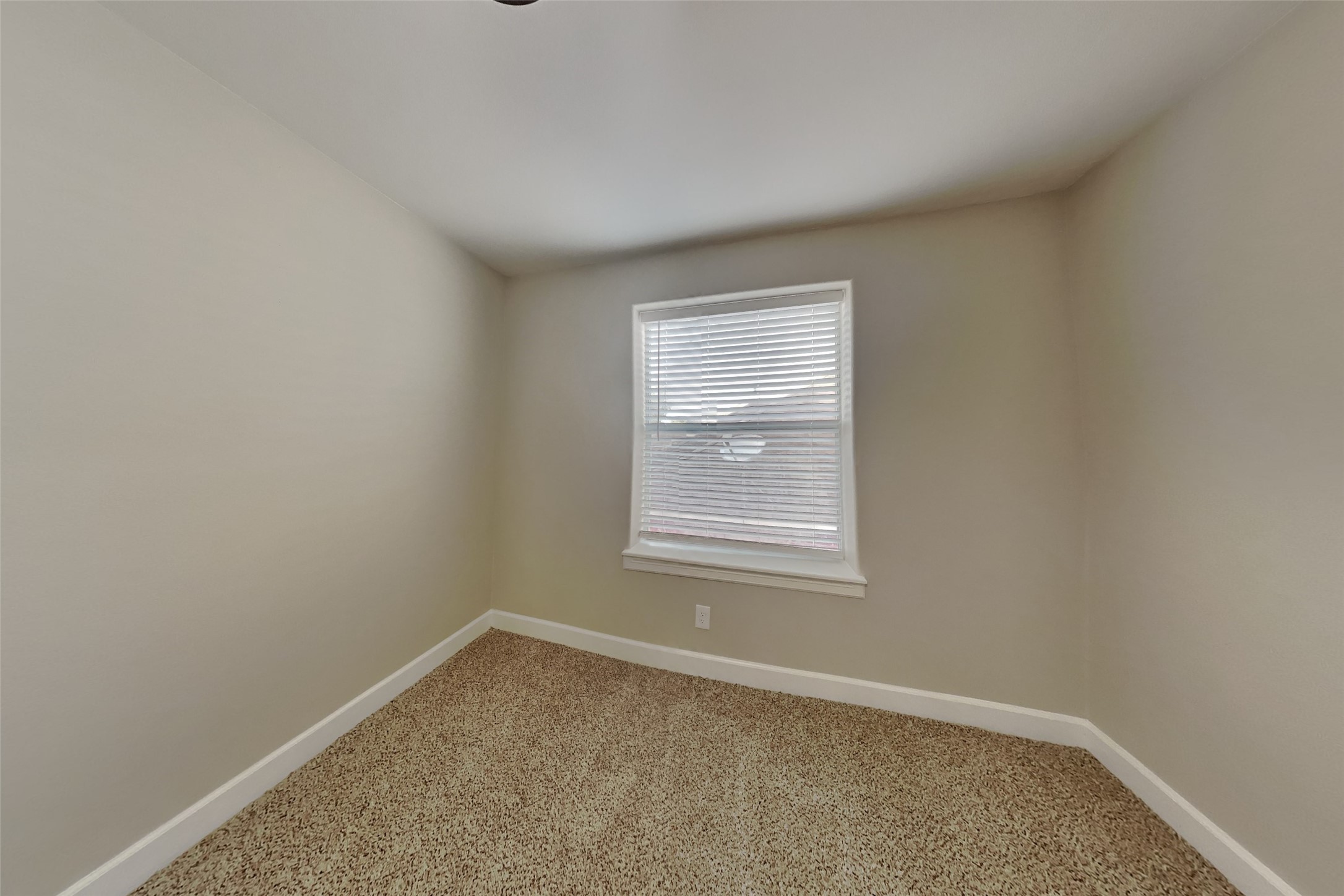 4718 Wild Bluebonnet Way Houston, TX 77084 - Photo 14 of 20 an empty room with windows
