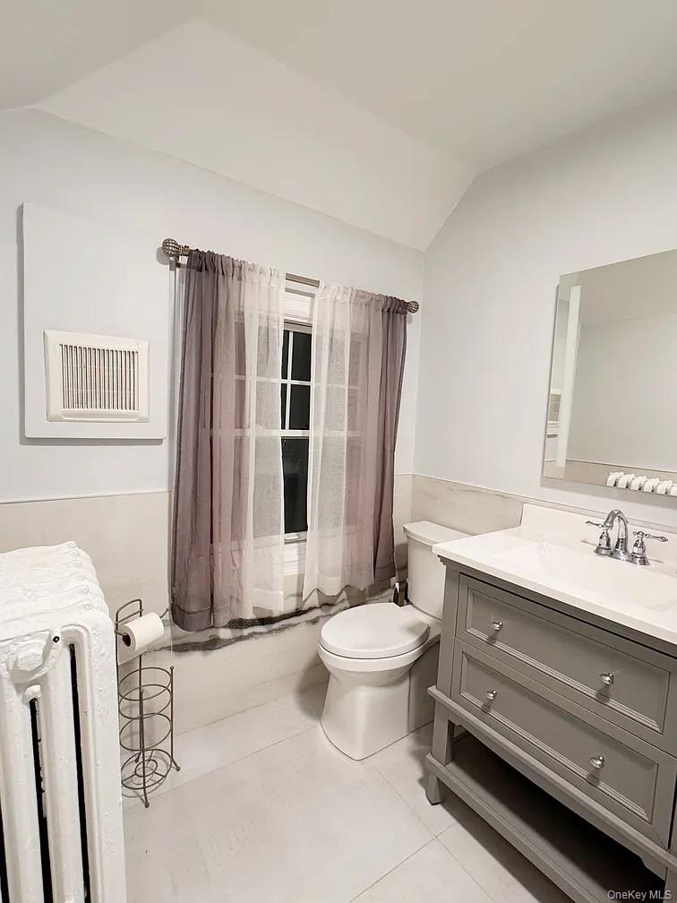 57 Pintard Avenue, Unit 3 New Rochelle, NY 10801 - Photo 11 of 23 a bathroom with a sink toilet and shower