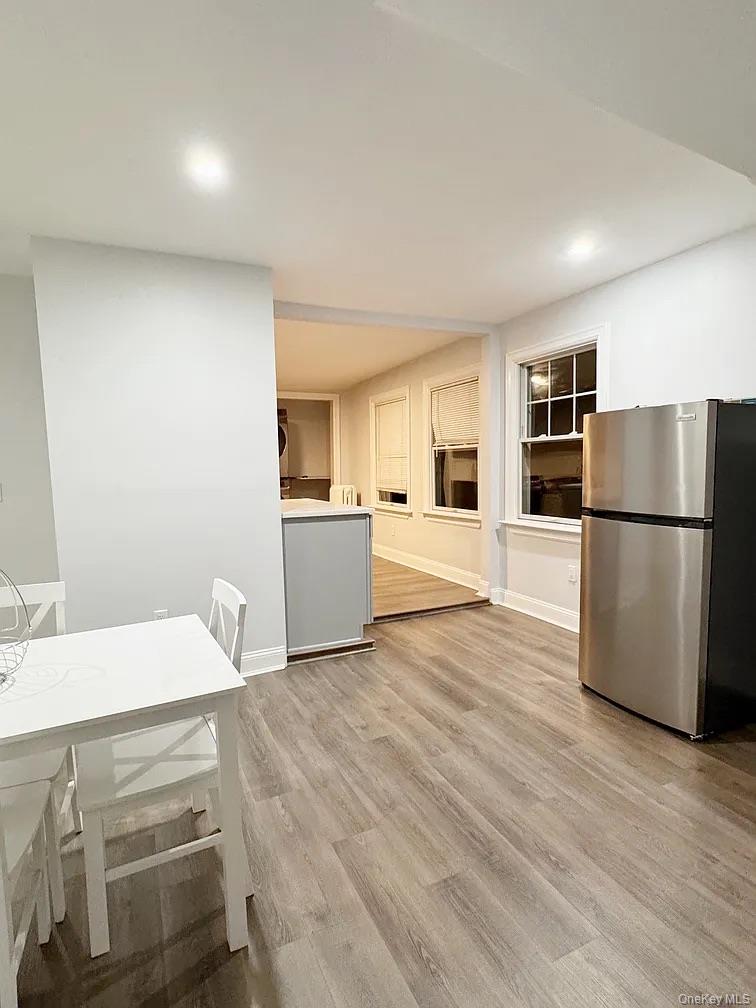 57 Pintard Avenue, Unit 3 New Rochelle, NY 10801 - Photo 13 of 23 a kitchen with a refrigerator and a sink