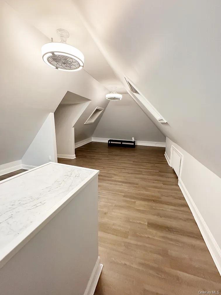 57 Pintard Avenue, Unit 3 New Rochelle, NY 10801 - Photo 20 of 23 a view of a hallway with wooden floor