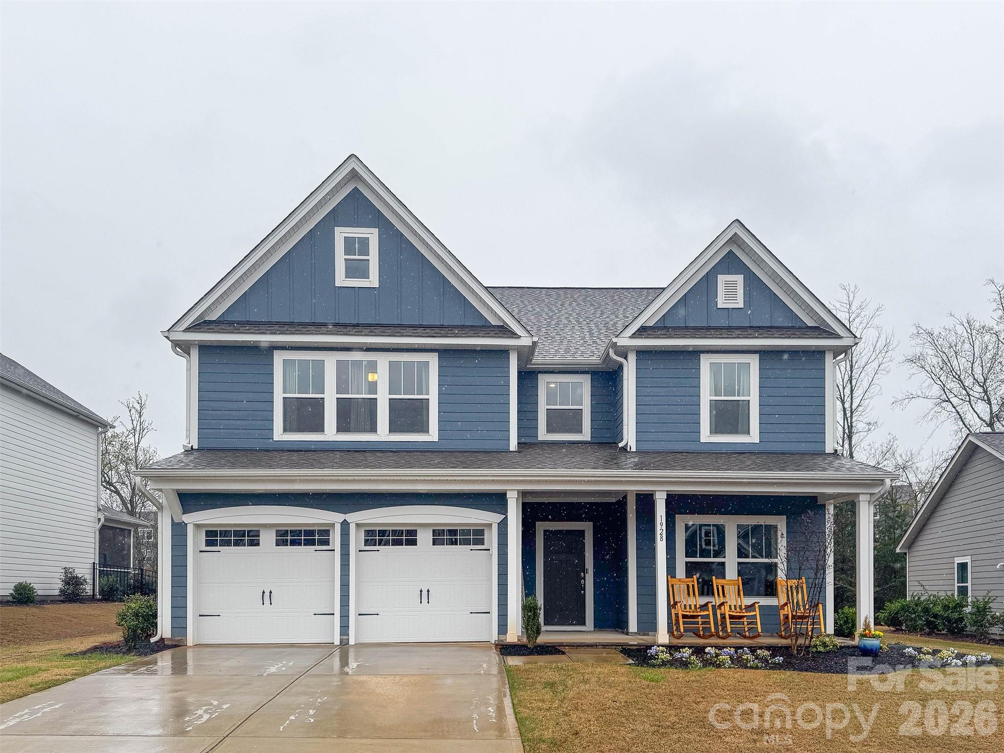 1928 Thoreau Way York, SC 29745 - Photo 1 of 43 a front view of a house with a yard and garage