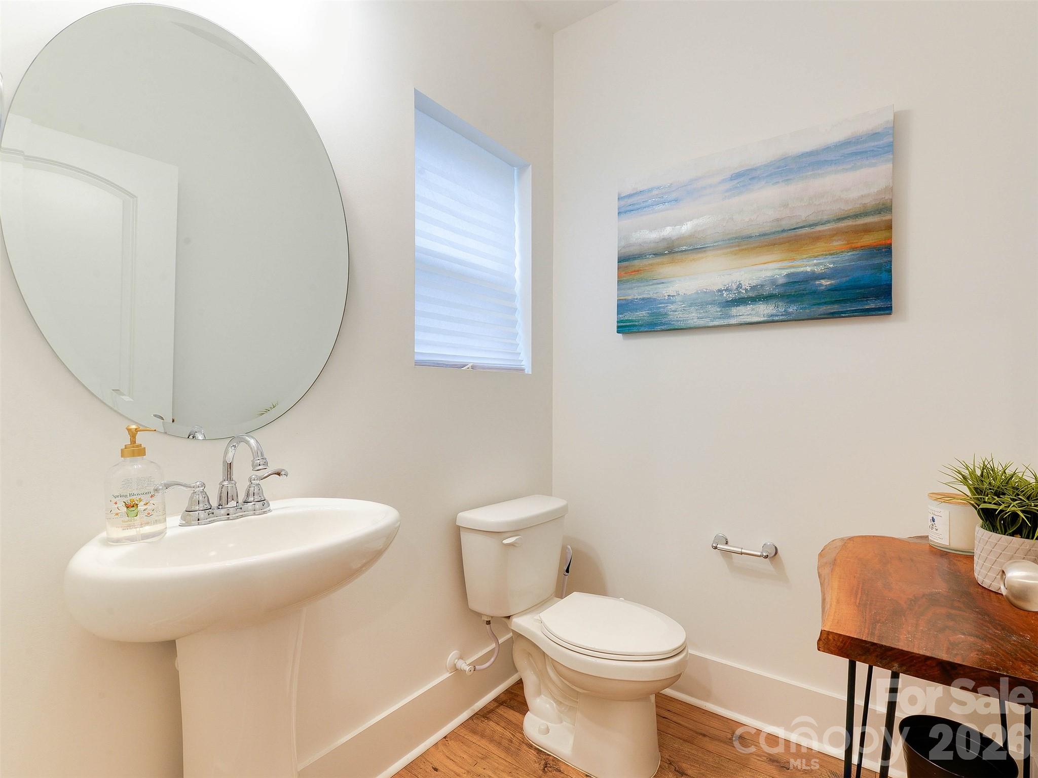 1928 Thoreau Way York, SC 29745 - Photo 22 of 43 a bathroom with a toilet a sink and a mirror