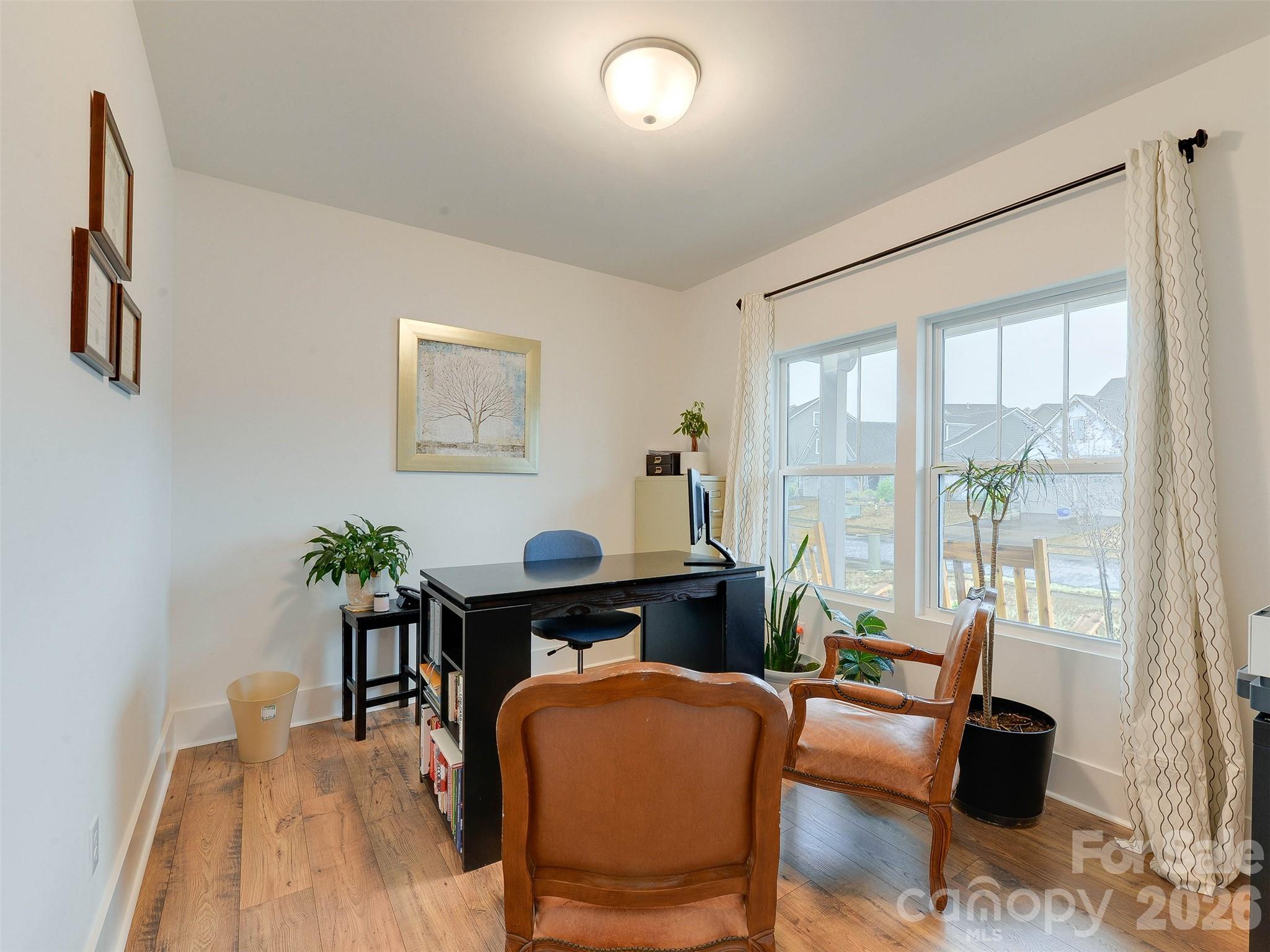 1928 Thoreau Way York, SC 29745 - Photo 23 of 43 a living room with furniture and a large window