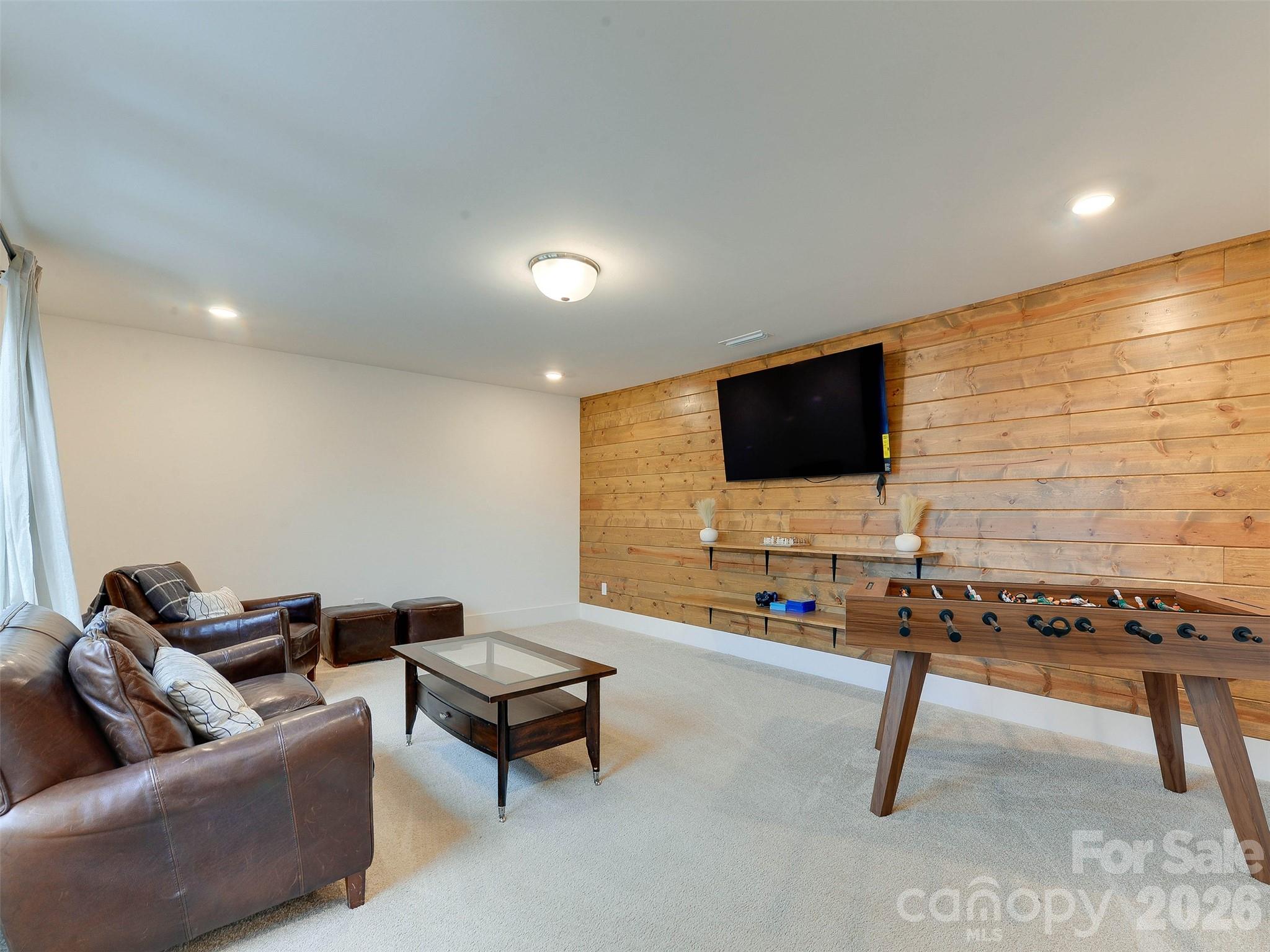 1928 Thoreau Way York, SC 29745 - Photo 26 of 43 a living room with furniture and a flat screen tv