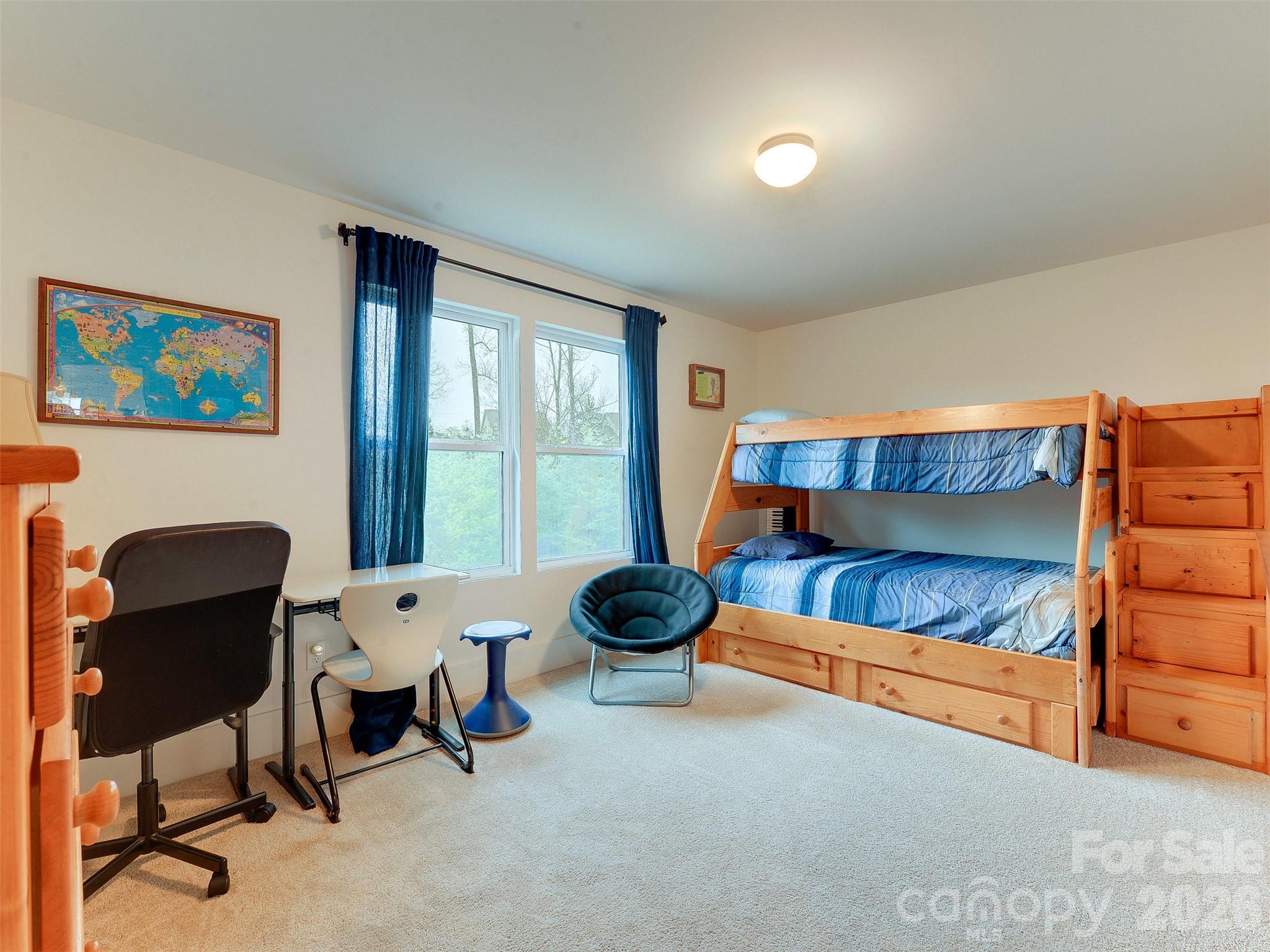 1928 Thoreau Way York, SC 29745 - Photo 27 of 43 a bedroom with a bed and a chair