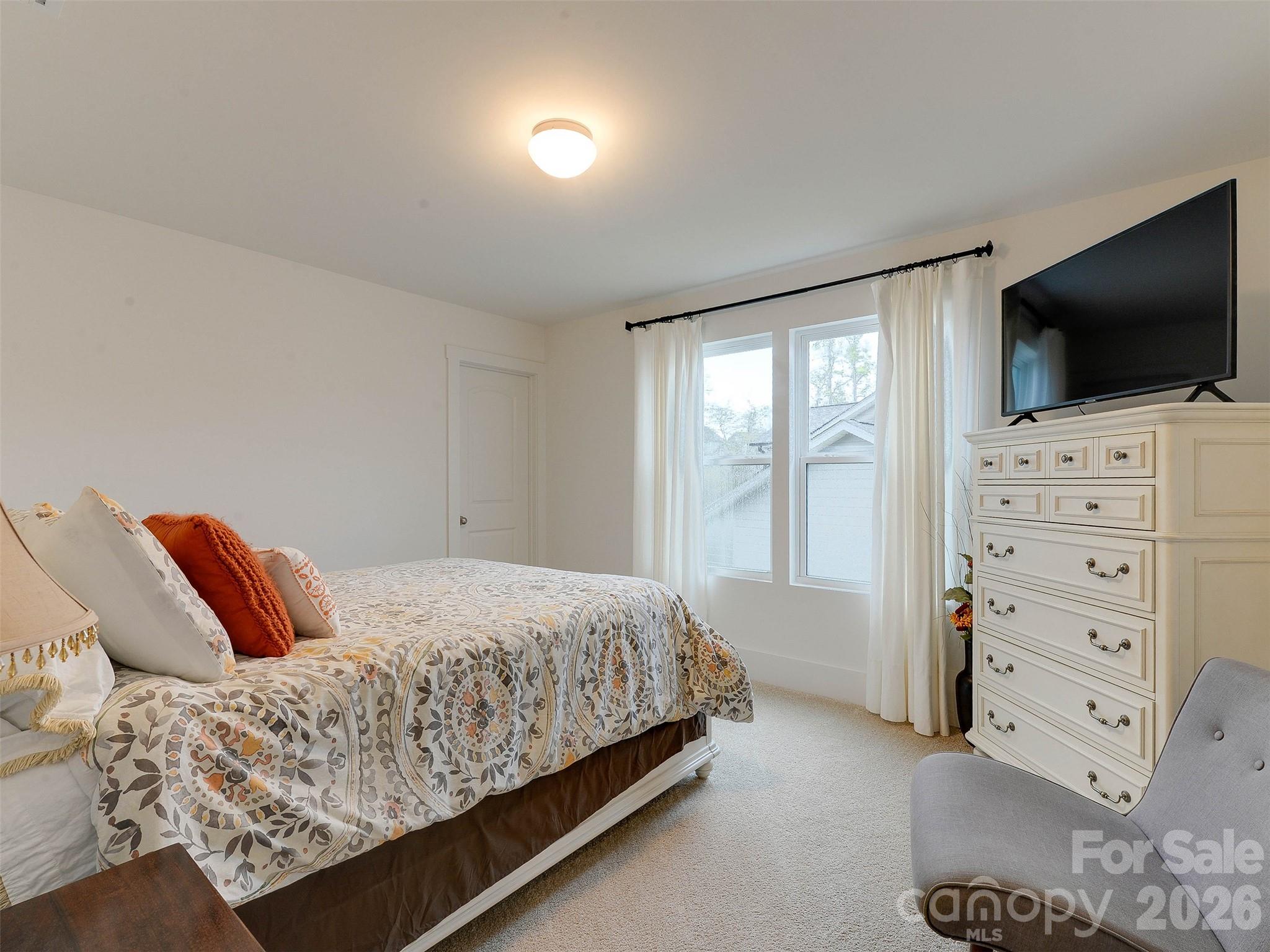 1928 Thoreau Way York, SC 29745 - Photo 33 of 43 a bedroom with a bed and flat screen tv