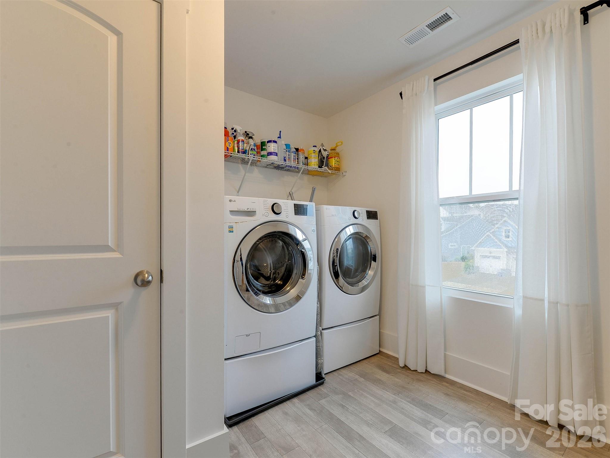 1928 Thoreau Way York, SC 29745 - Photo 34 of 43 a utility room with dryer and washer