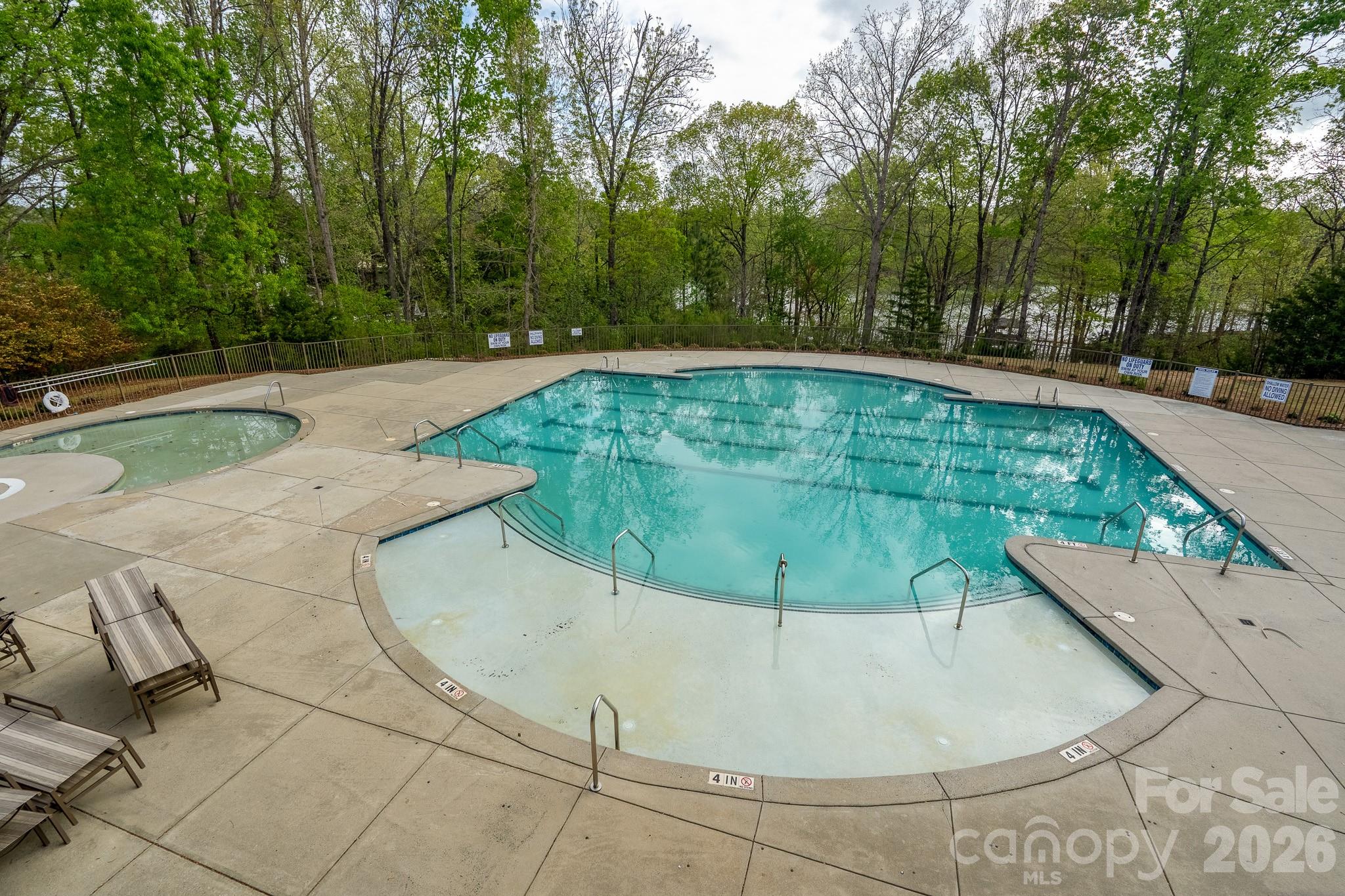 1928 Thoreau Way York, SC 29745 - Photo 38 of 43 a view of a swimming pool with a sitting space