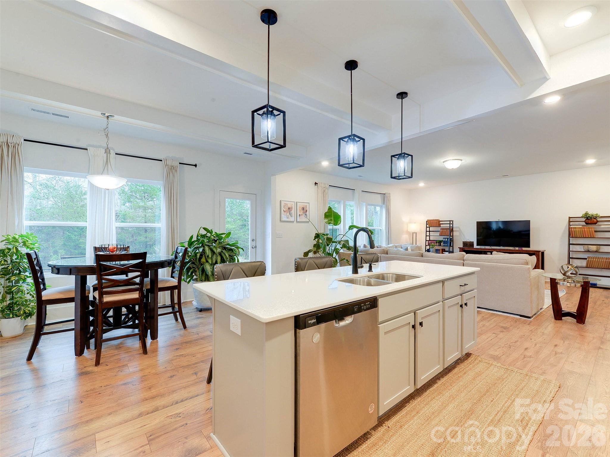 1928 Thoreau Way York, SC 29745 - Photo 5 of 43 a kitchen with a table and chairs in it