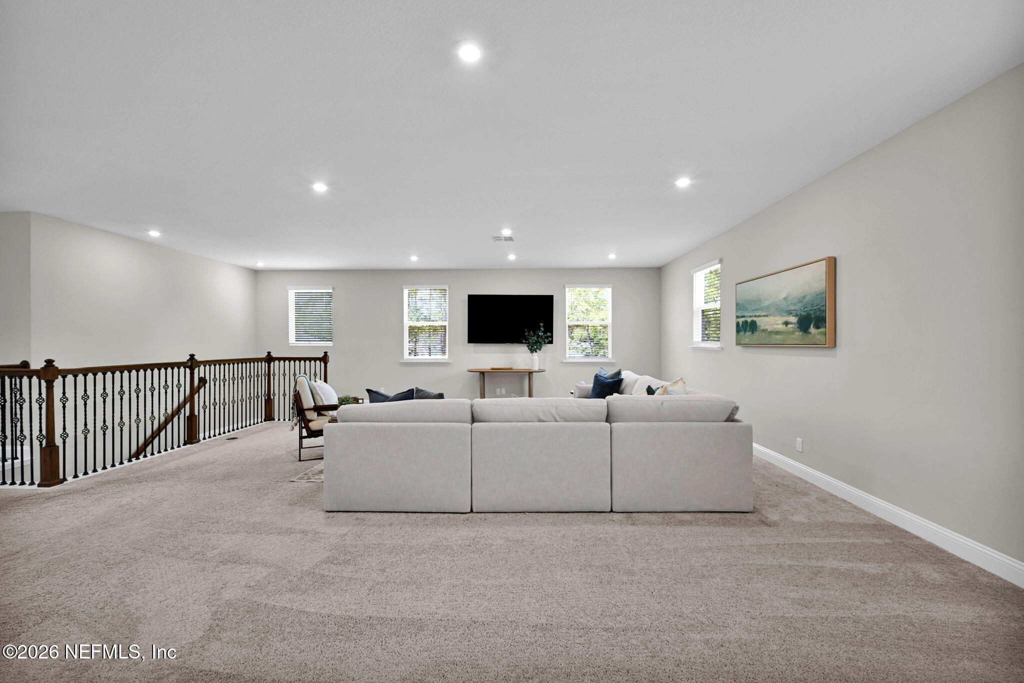 4050 Coyote Court Middleburg, FL 32068 - Photo 42 of 93 a living room with furniture and a flat screen tv