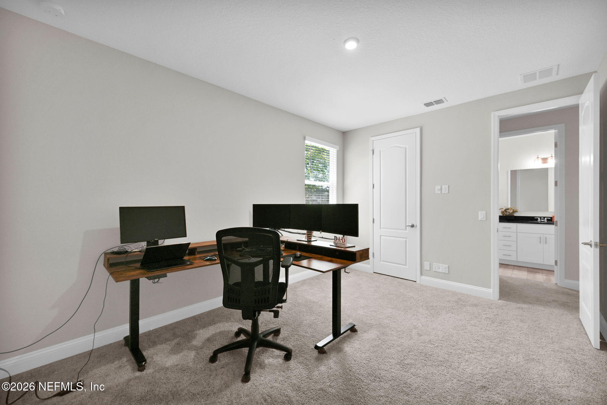 4050 Coyote Court Middleburg, FL 32068 - Photo 47 of 93 a view of a workspace with furniture