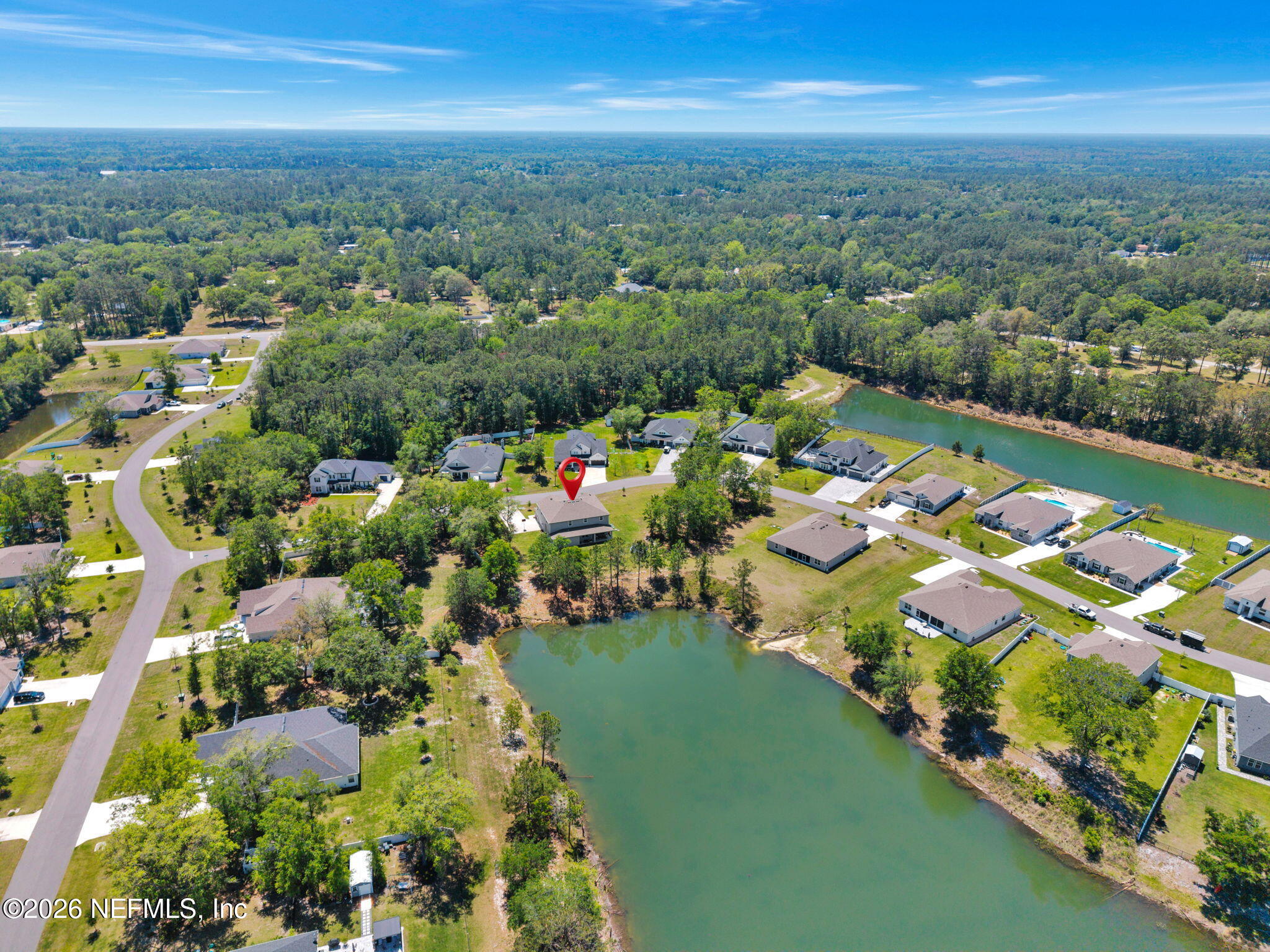 4050 Coyote Court Middleburg, FL 32068 - Photo 84 of 93 an aerial view of a city with lots of residential buildings ocean and mountain view in back