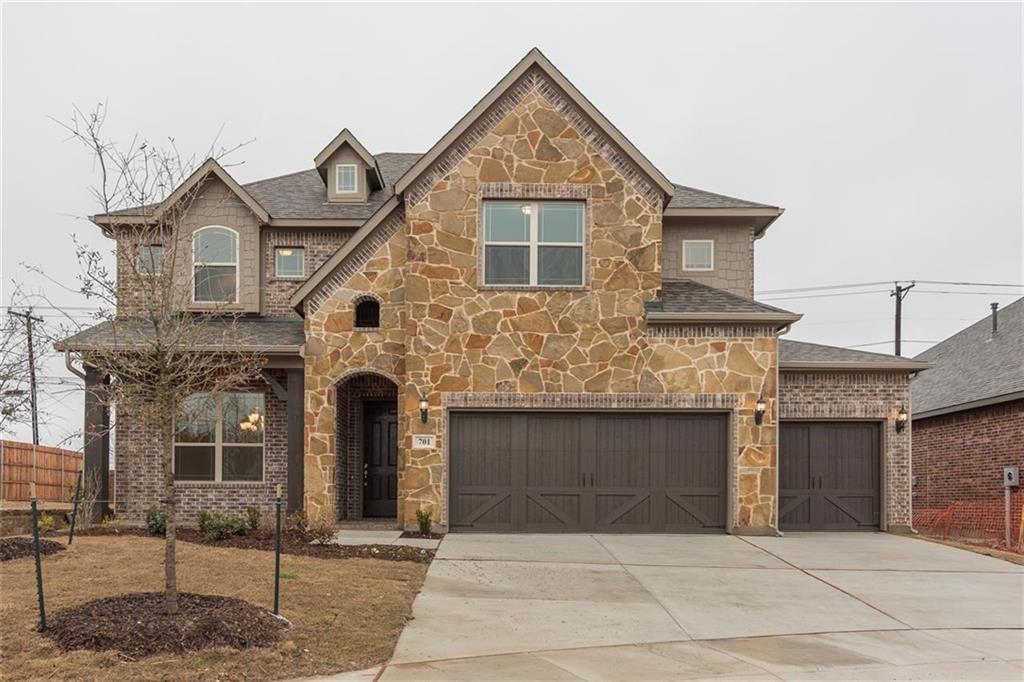 701 Rockingham Drive Wylie, TX 75098 - Photo 1 of 1 a front view of a house with yard