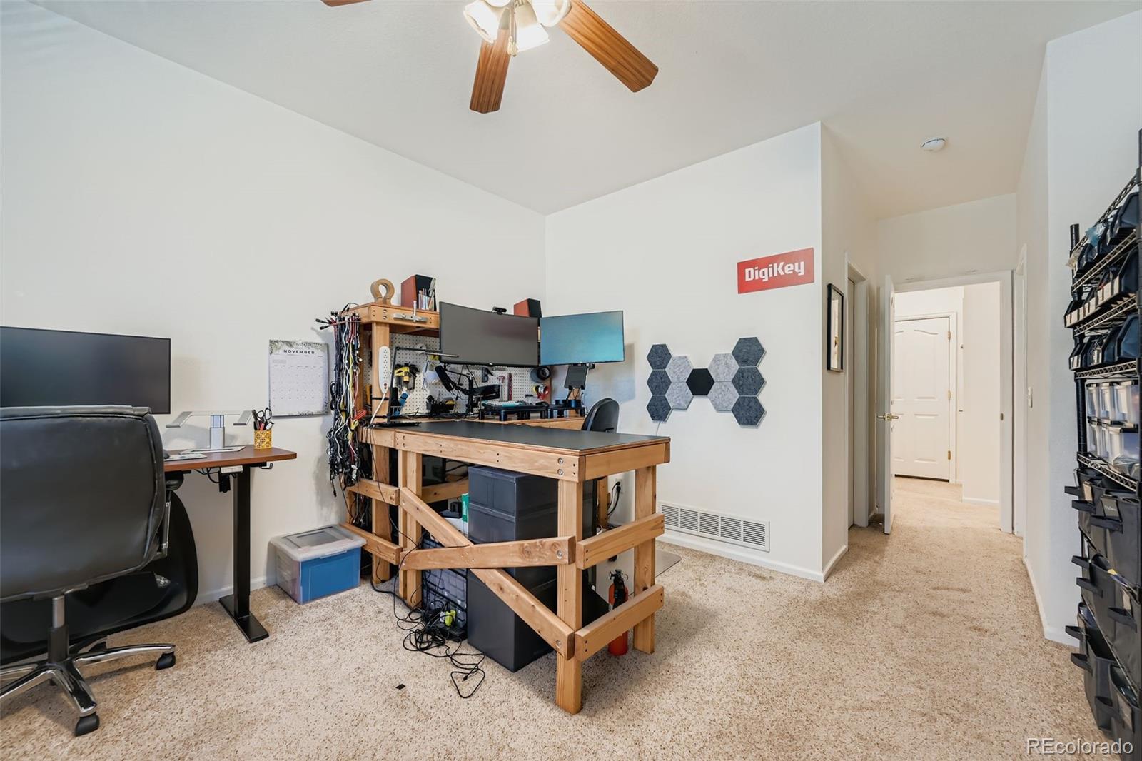 208 Remuda Lane Lafayette, CO 80026 - Photo 13 of 28 a view of a workspace with furniture