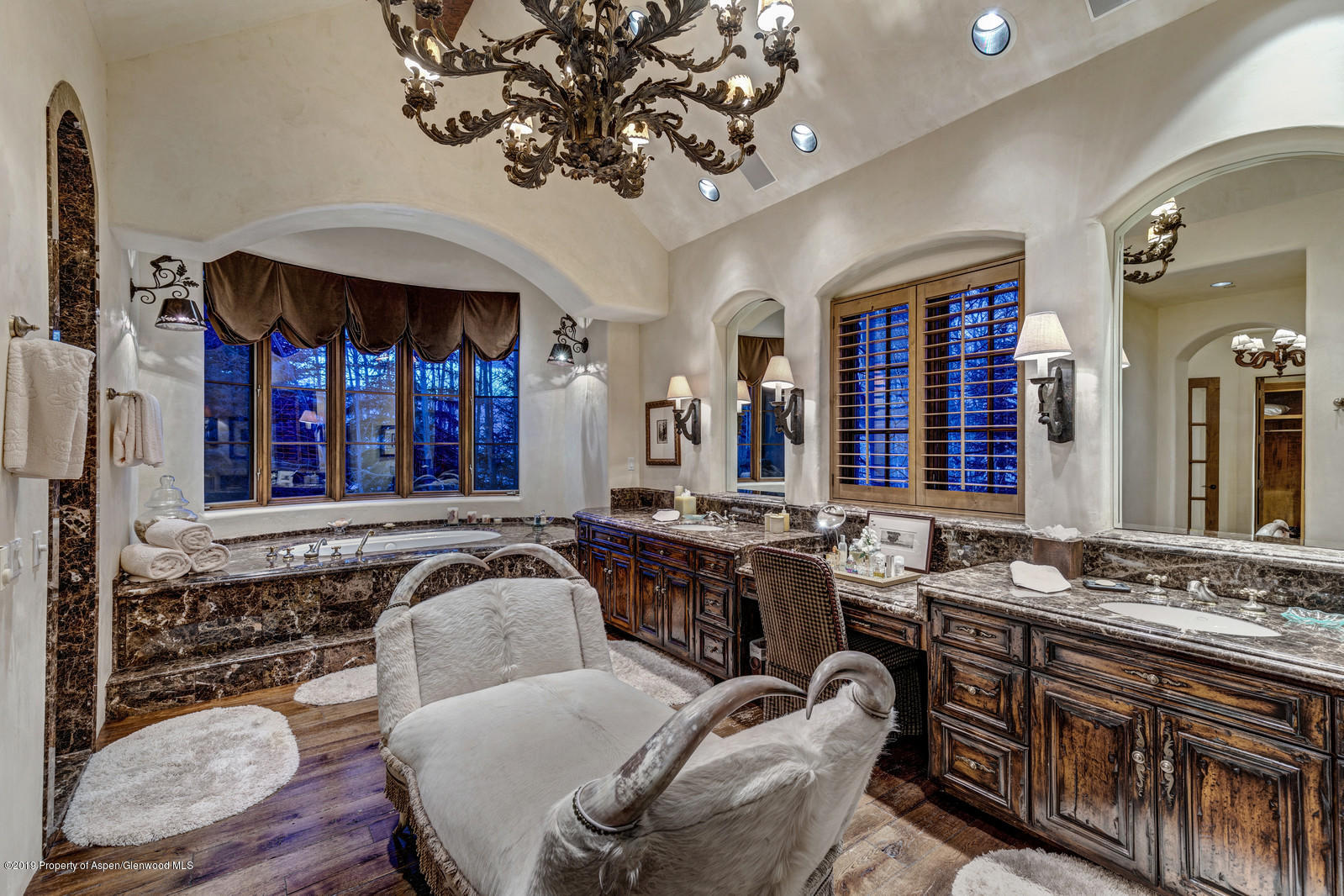 124 Cold Stream Lane Aspen, CO 81611 - Photo 25 of 38 a view of a dining room with furniture window and wooden floor