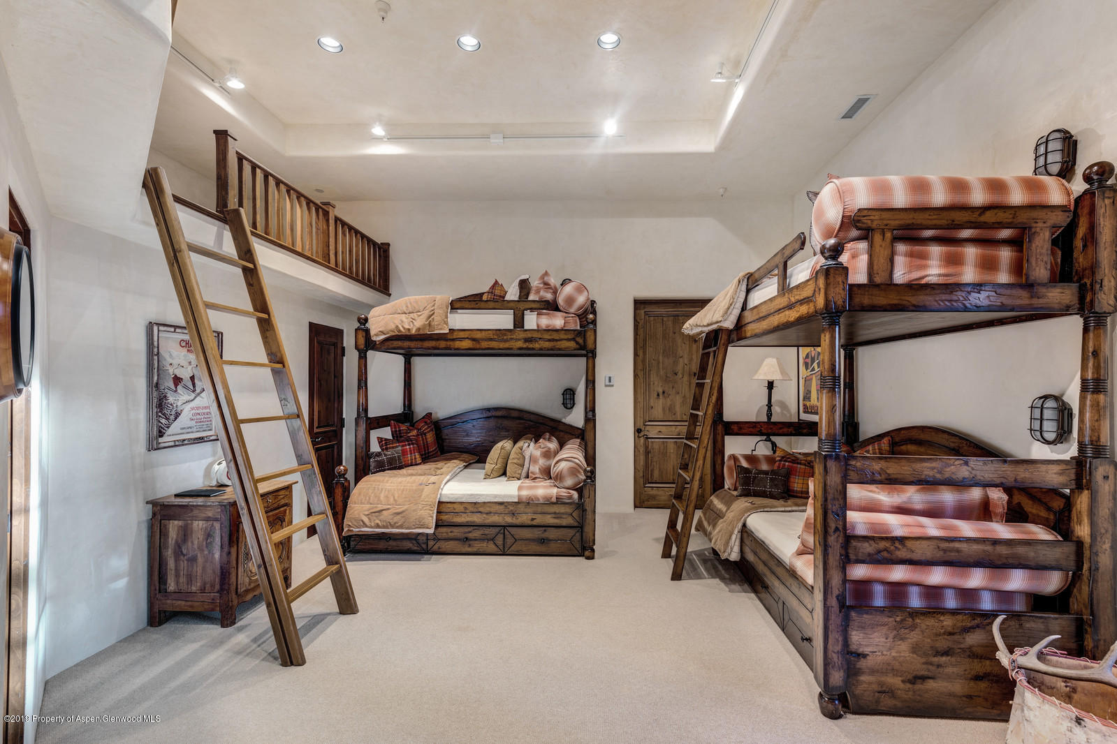 124 Cold Stream Lane Aspen, CO 81611 - Photo 35 of 38 a bedroom with two bunk beds and a couch