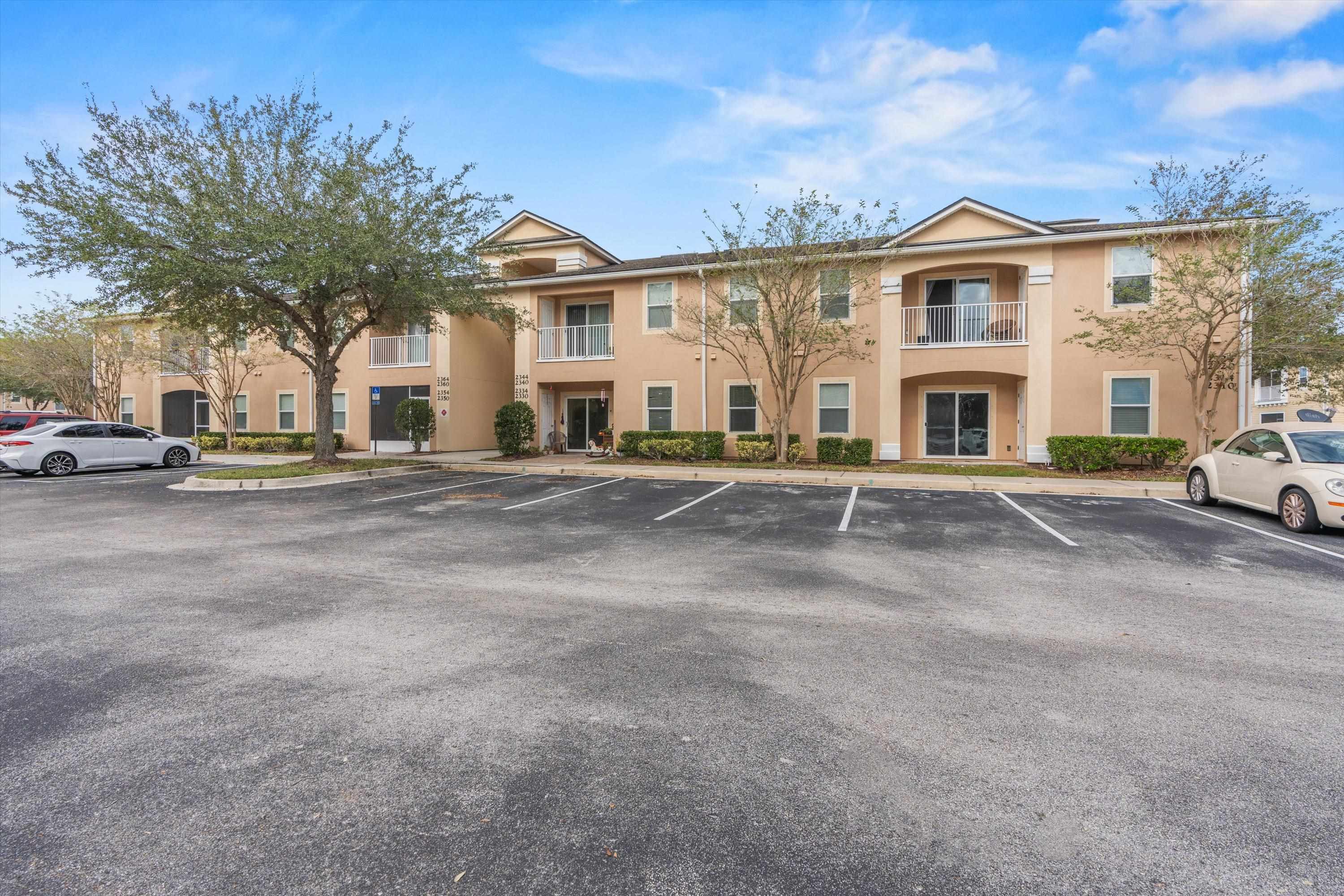 2330 Golden Lake Loop St. Augustine, FL 32084 - Photo 1 of 23 a view of multiple houses with a street