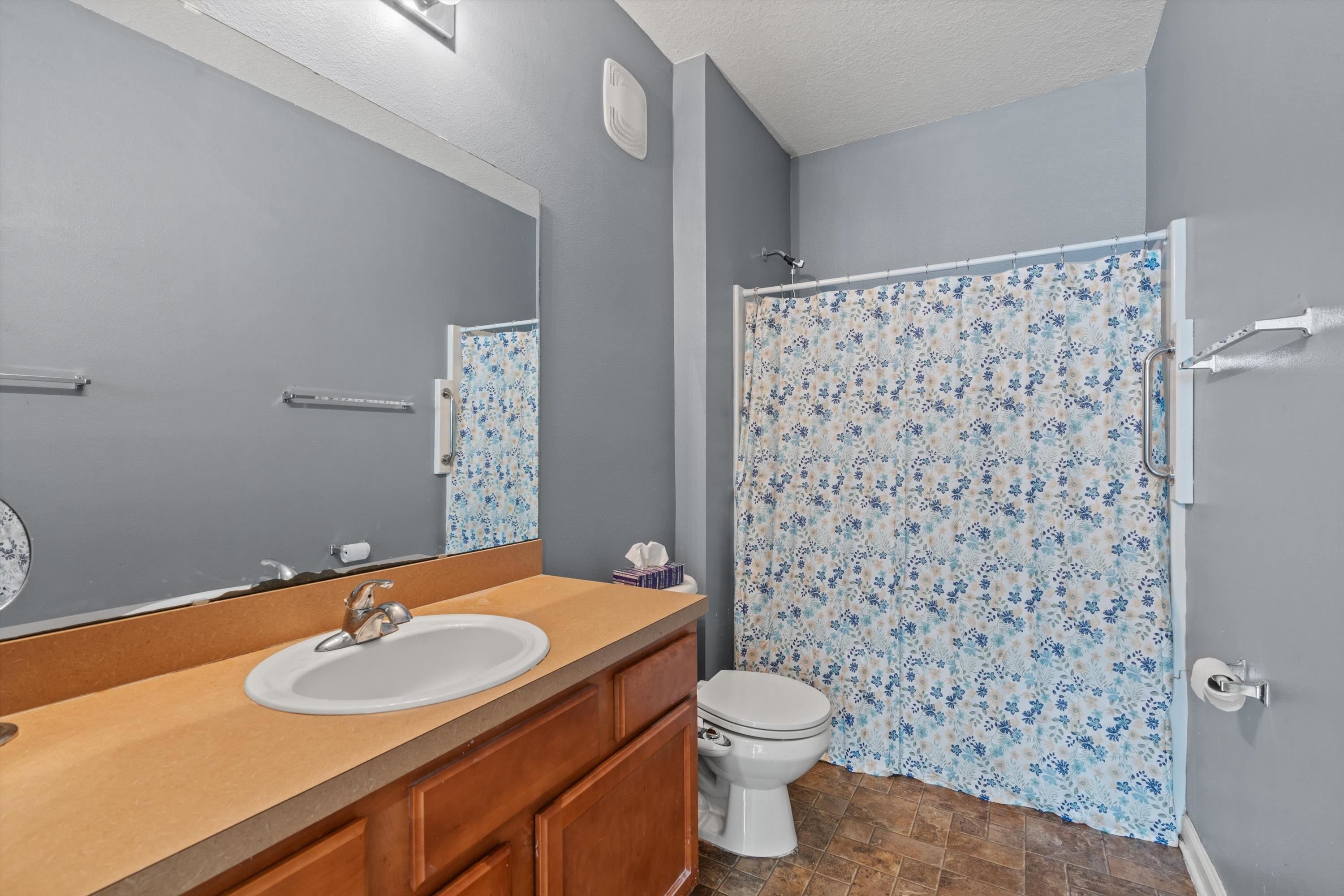 2330 Golden Lake Loop St. Augustine, FL 32084 - Photo 13 of 23 a bathroom with a sink toilet and shower