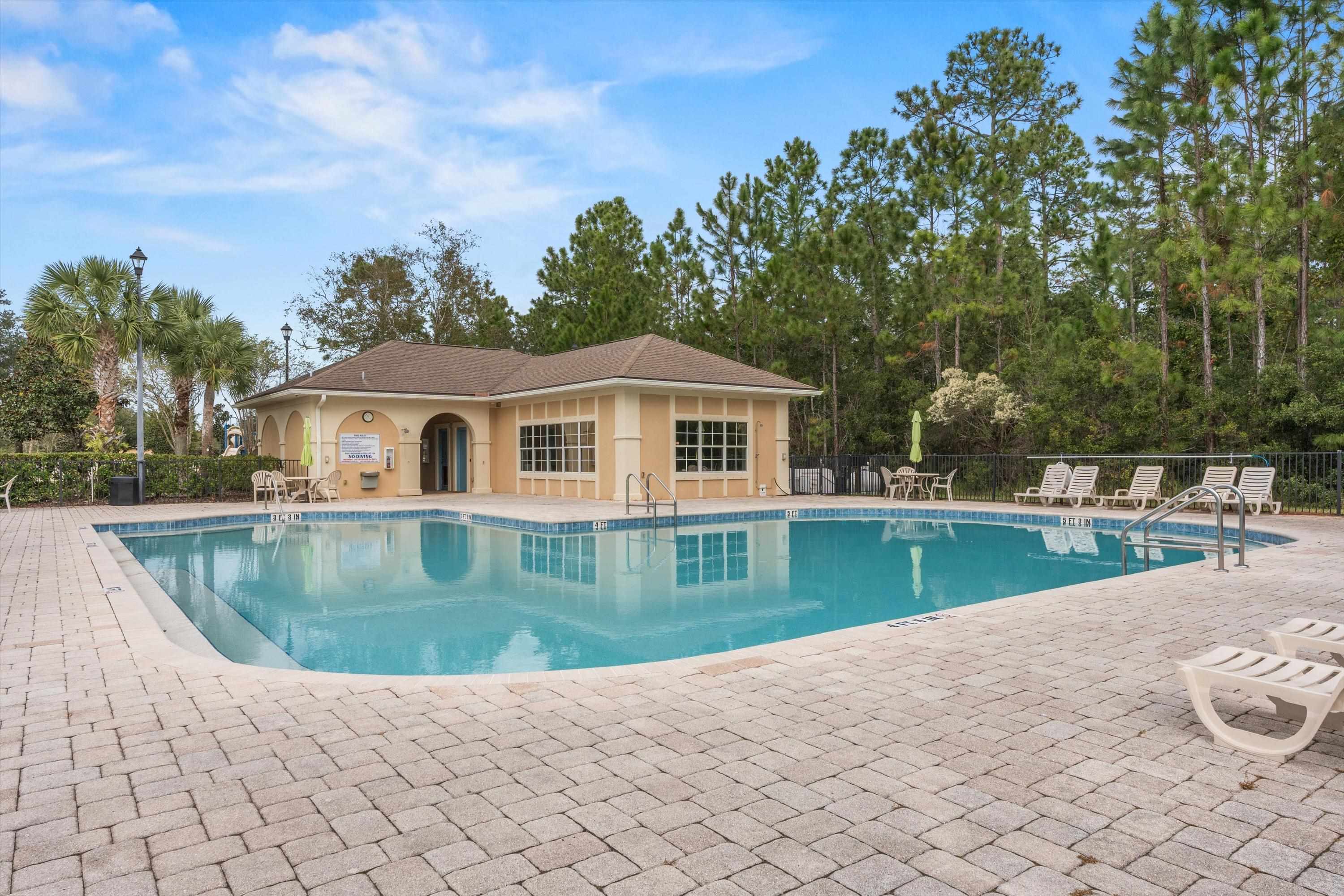2330 Golden Lake Loop St. Augustine, FL 32084 - Photo 20 of 23 a view of a house with a backyard