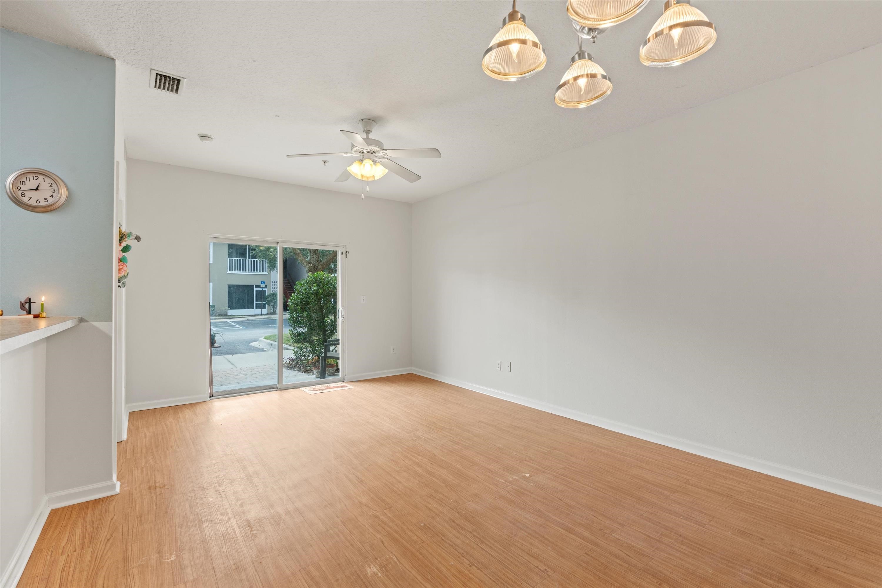 2330 Golden Lake Loop St. Augustine, FL 32084 - Photo 4 of 23 wooden floor in an empty room with a window