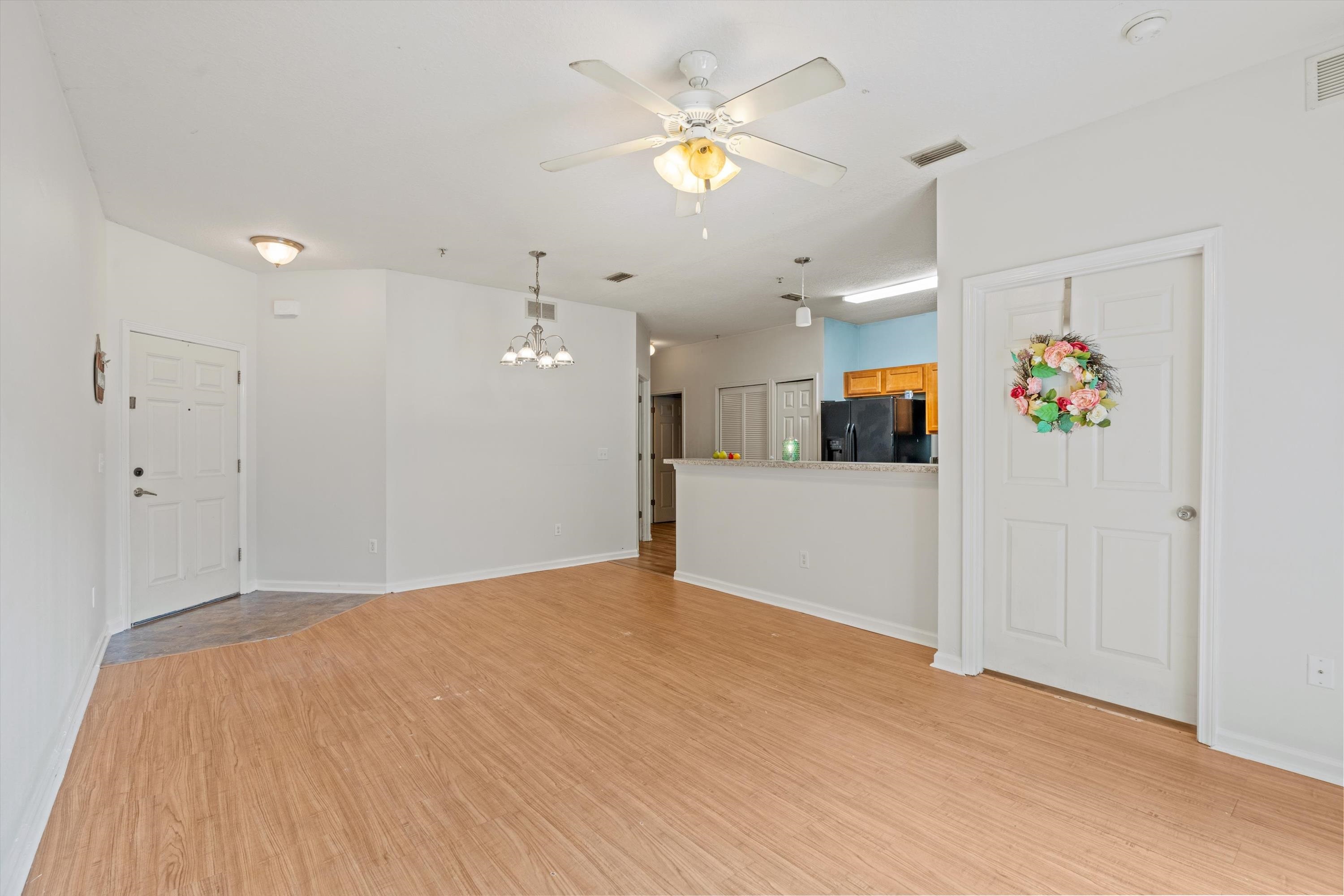 2330 Golden Lake Loop St. Augustine, FL 32084 - Photo 5 of 23 a view of a livingroom with a kitchen and a stove