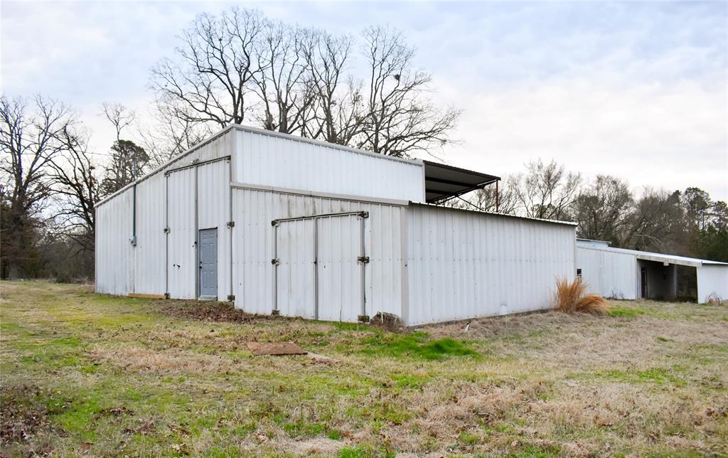 509 County Road 35985 Powderly, TX 75473 - Photo 18 of 37 a view of a backyard