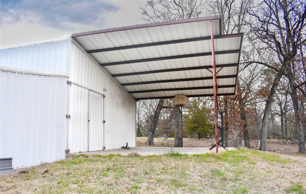 509 County Road 35985 Powderly, TX 75473 - Photo 19 of 37 a view of a backyard