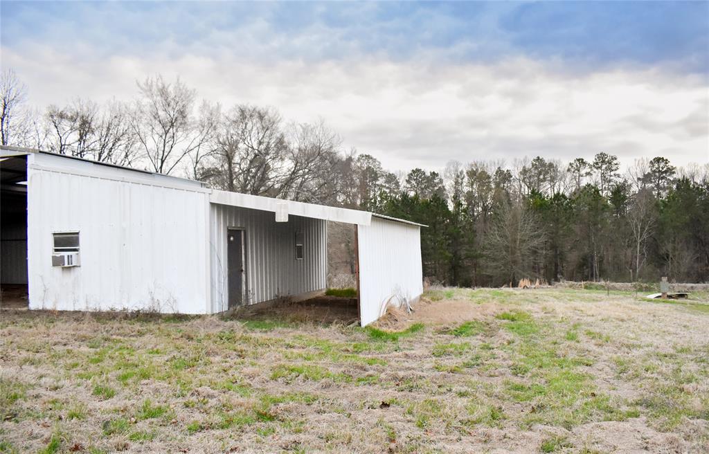 509 County Road 35985 Powderly, TX 75473 - Photo 20 of 37 a view of wooden house