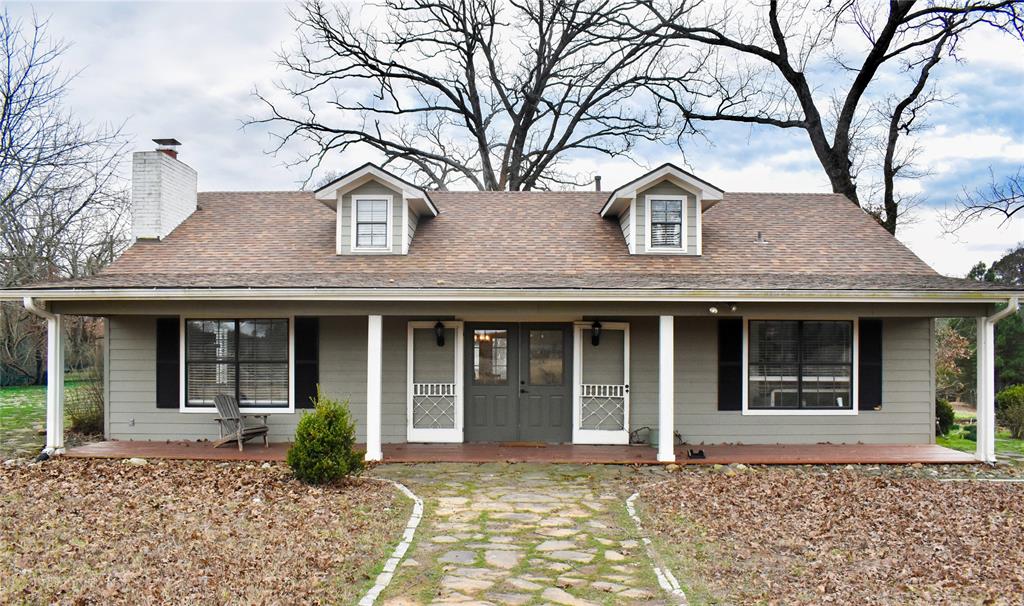 509 County Road 35985 Powderly, TX 75473 - Photo 8 of 37 a house view with a outdoor space