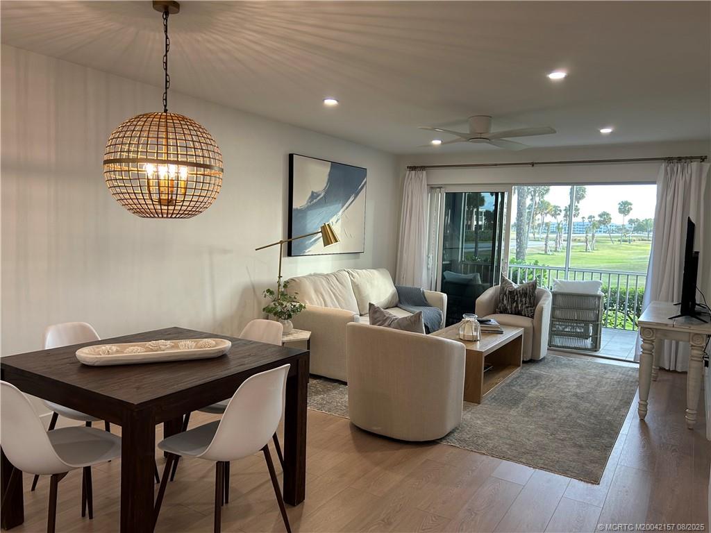484 Northeast Plantation Road, Unit 4102 Stuart, FL 34996 - Photo 1 of 35 a living room with furniture and a window