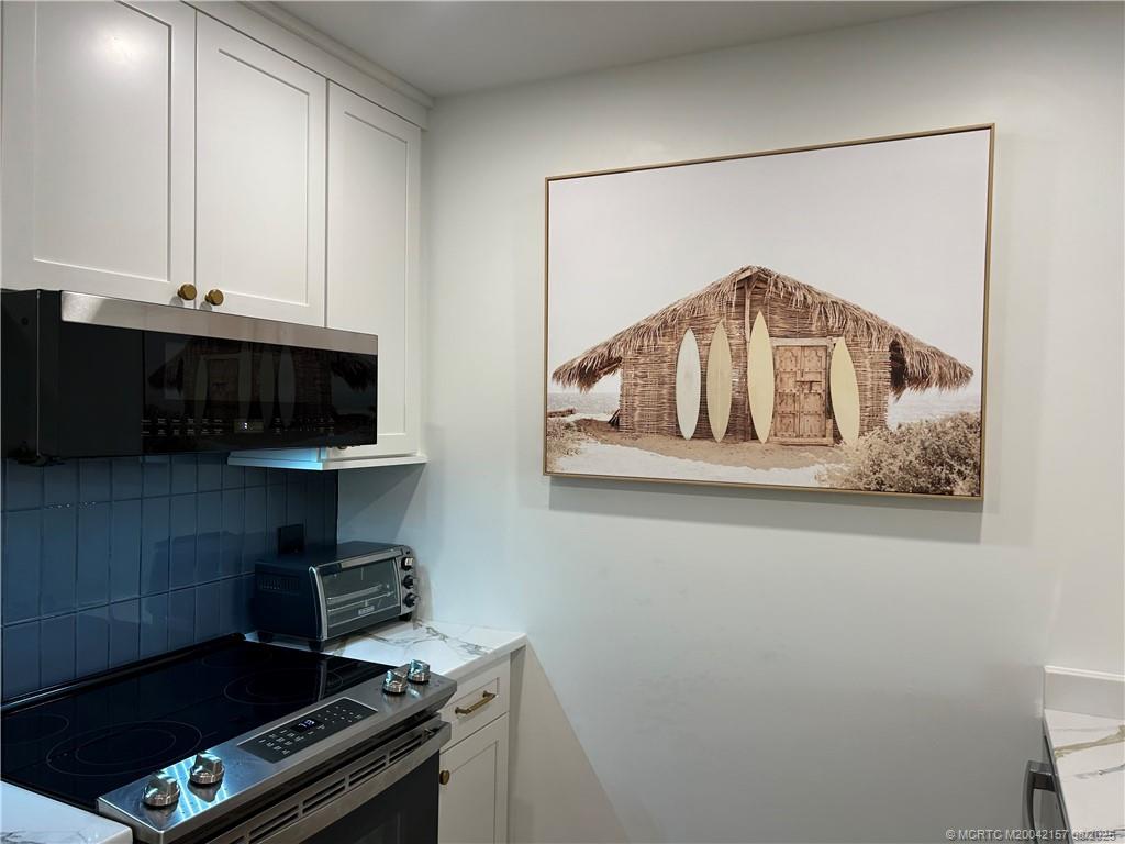 484 Northeast Plantation Road, Unit 4102 Stuart, FL 34996 - Photo 12 of 35 a room with storage and utility