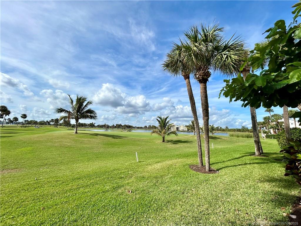 484 Northeast Plantation Road, Unit 4102 Stuart, FL 34996 - Photo 30 of 35 a view of a playground with a garden