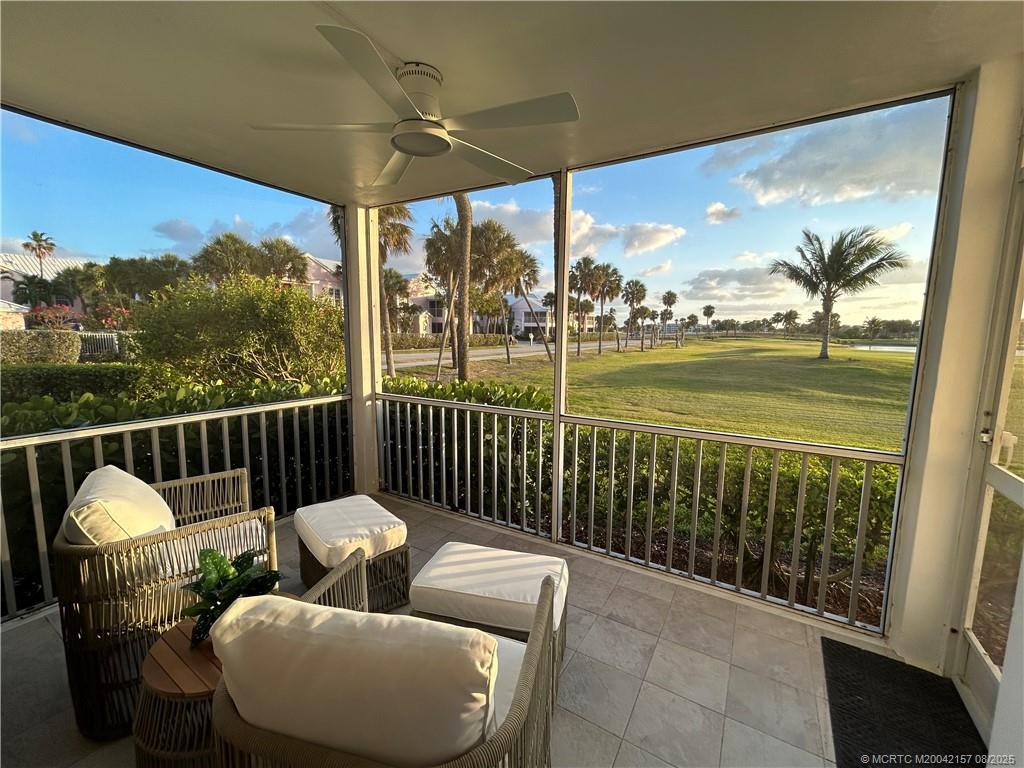 484 Northeast Plantation Road, Unit 4102 Stuart, FL 34996 - Photo 3 of 35 a balcony with furniture