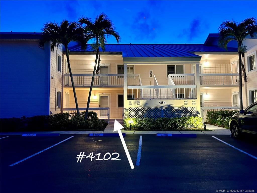 484 Northeast Plantation Road, Unit 4102 Stuart, FL 34996 - Photo 32 of 35 a view of entryway with flower pots