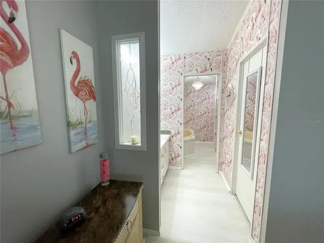 a bathroom with a bathtub and shower