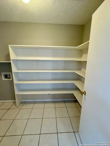 a view of a room with shelves