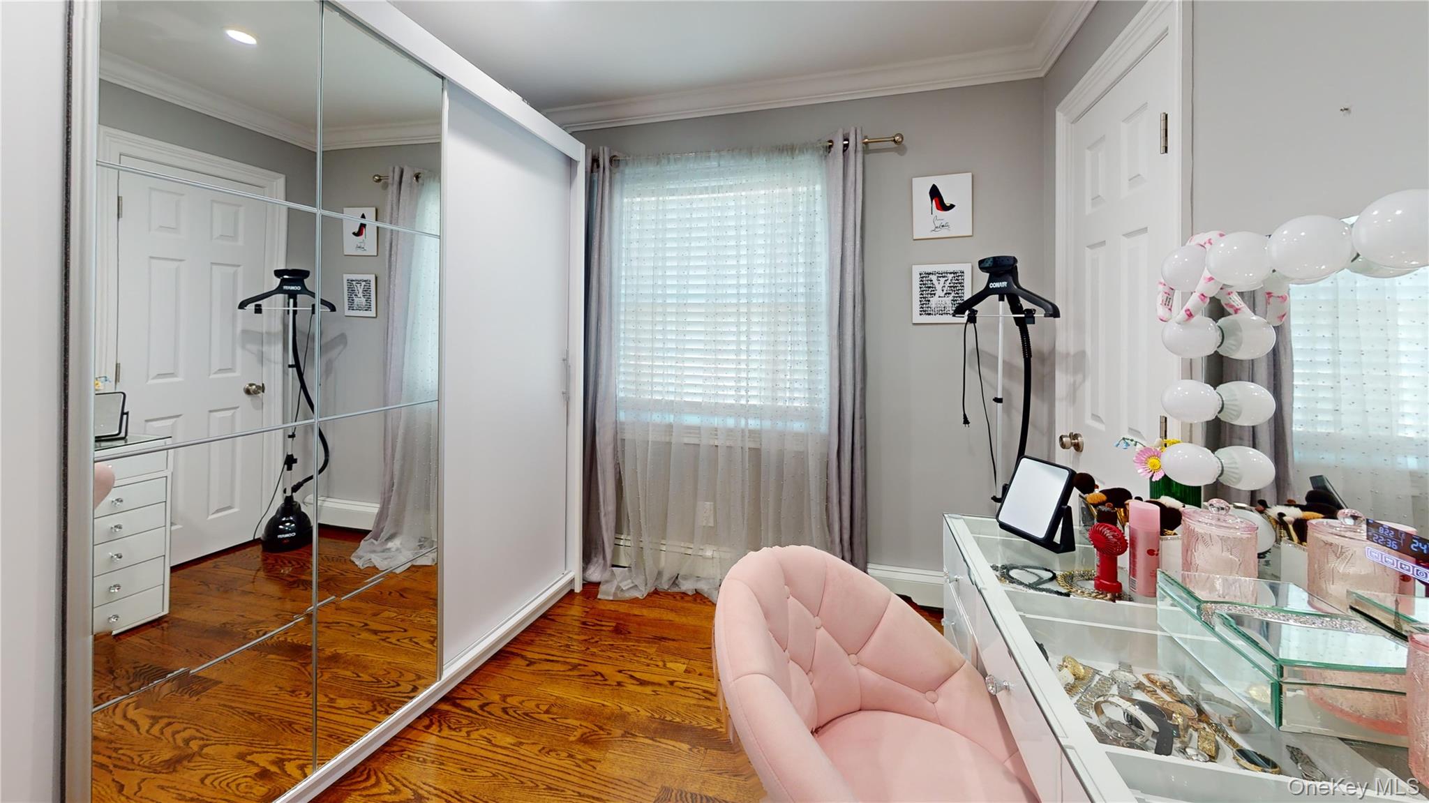 125 Spruce Street Lindenhurst, NY 11757 - Photo 16 of 29 Bathroom featuring wood finished floors and crown molding
