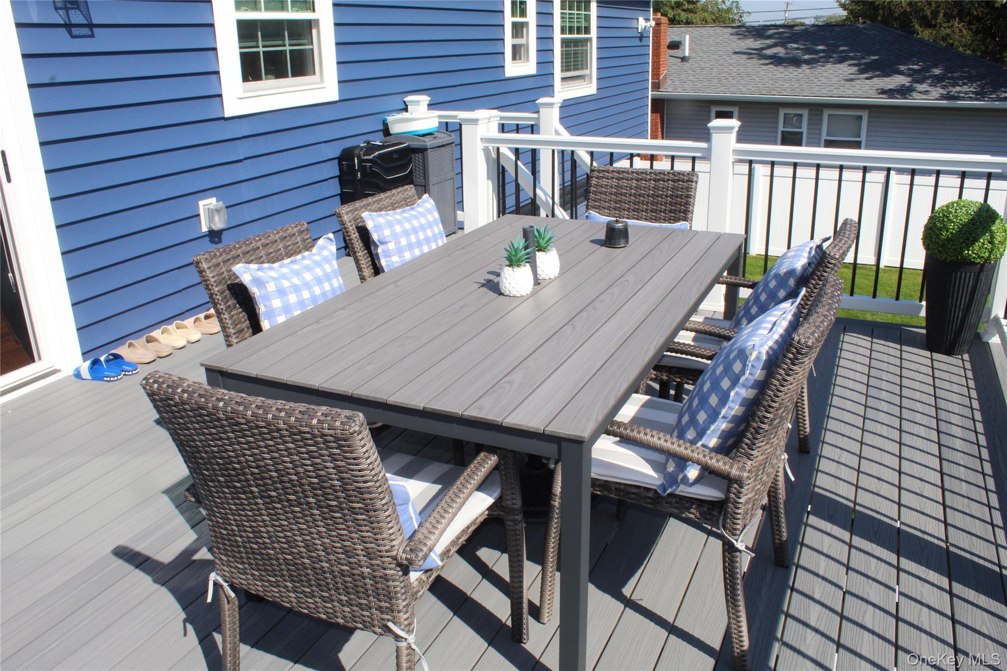 125 Spruce Street Lindenhurst, NY 11757 - Photo 6 of 29 Wooden deck featuring outdoor dining space
