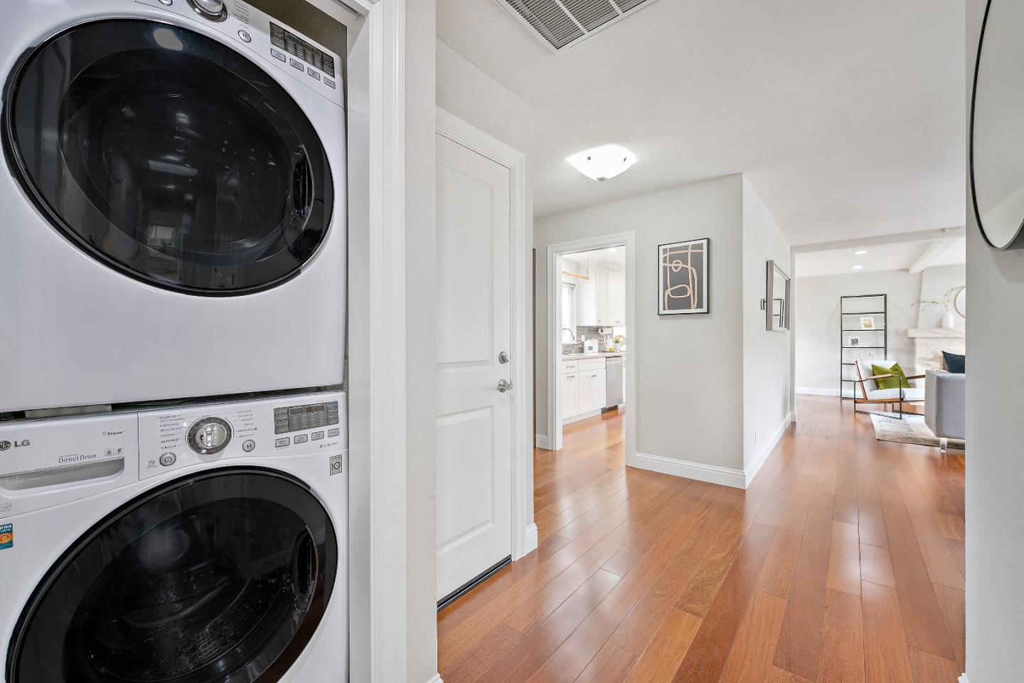 727 Liverpool Way Sunnyvale, CA 94087 - Photo 13 of 26 a view of a hallway with washer and dryer