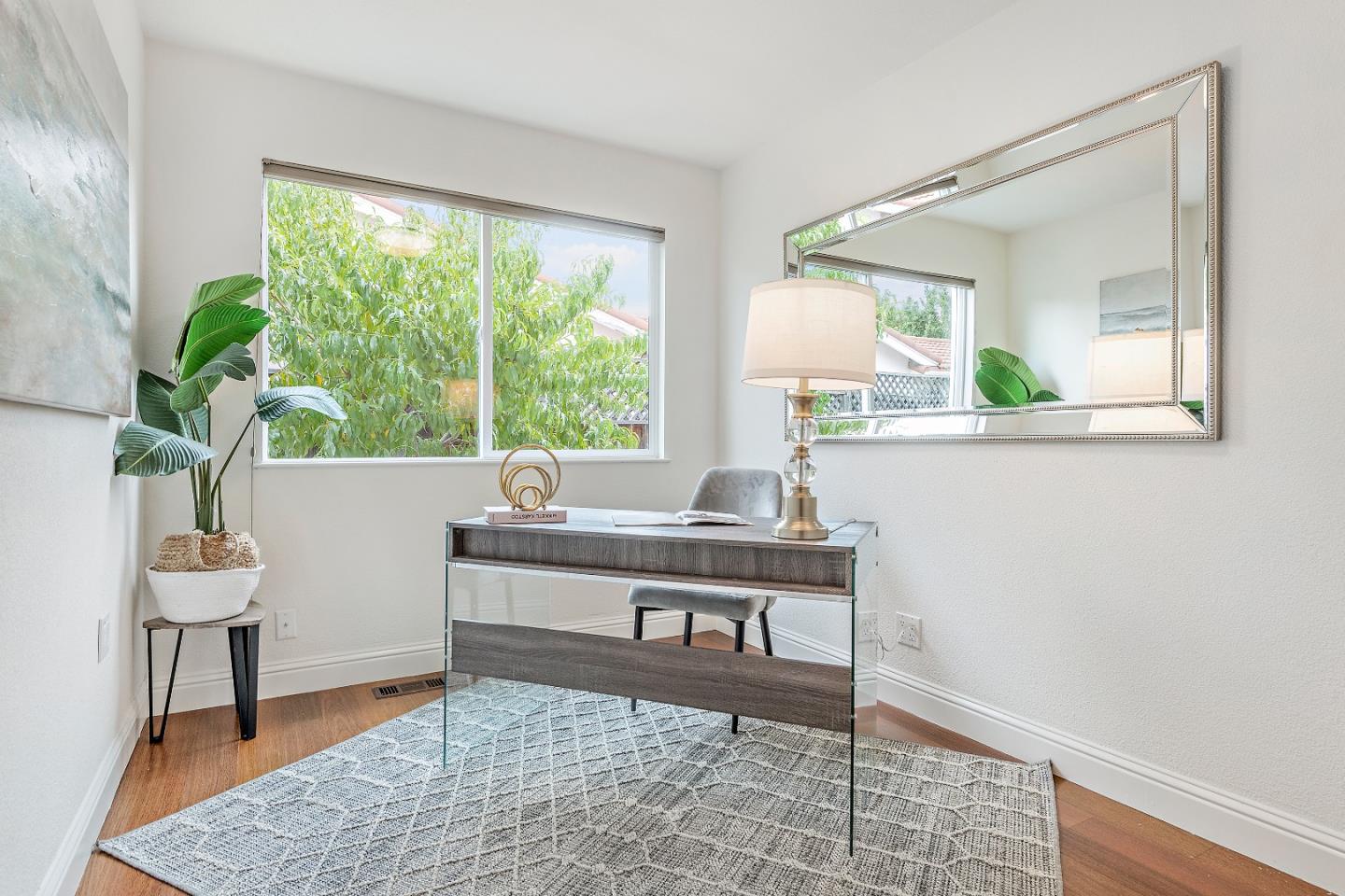 727 Liverpool Way Sunnyvale, CA 94087 - Photo 15 of 26 a living room with furniture and a window
