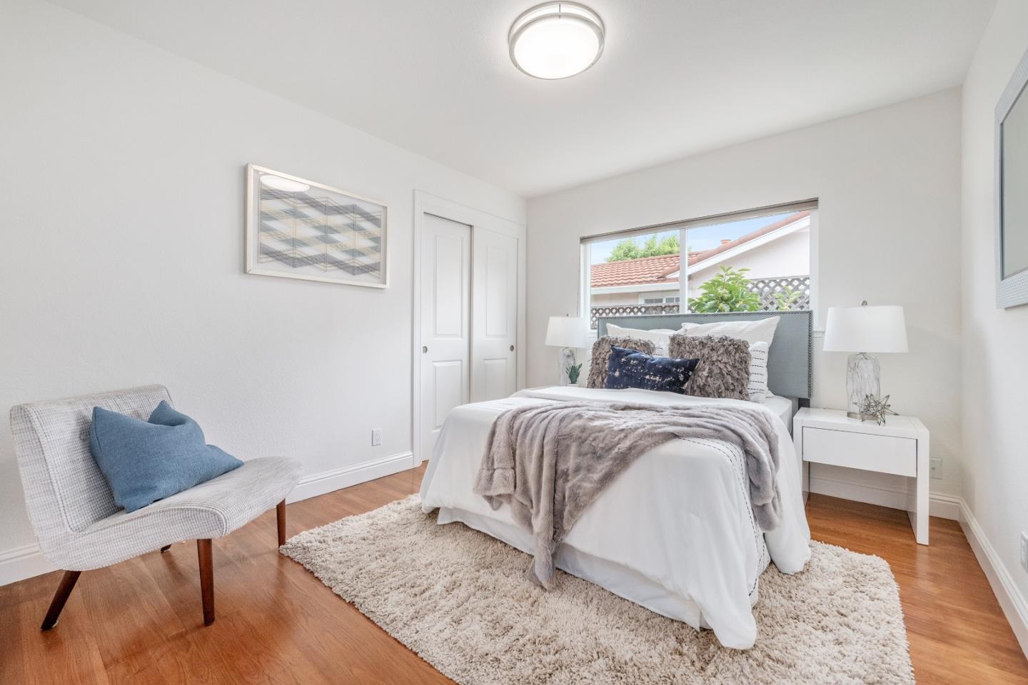 727 Liverpool Way Sunnyvale, CA 94087 - Photo 16 of 26 a bedroom with a bed and a couch