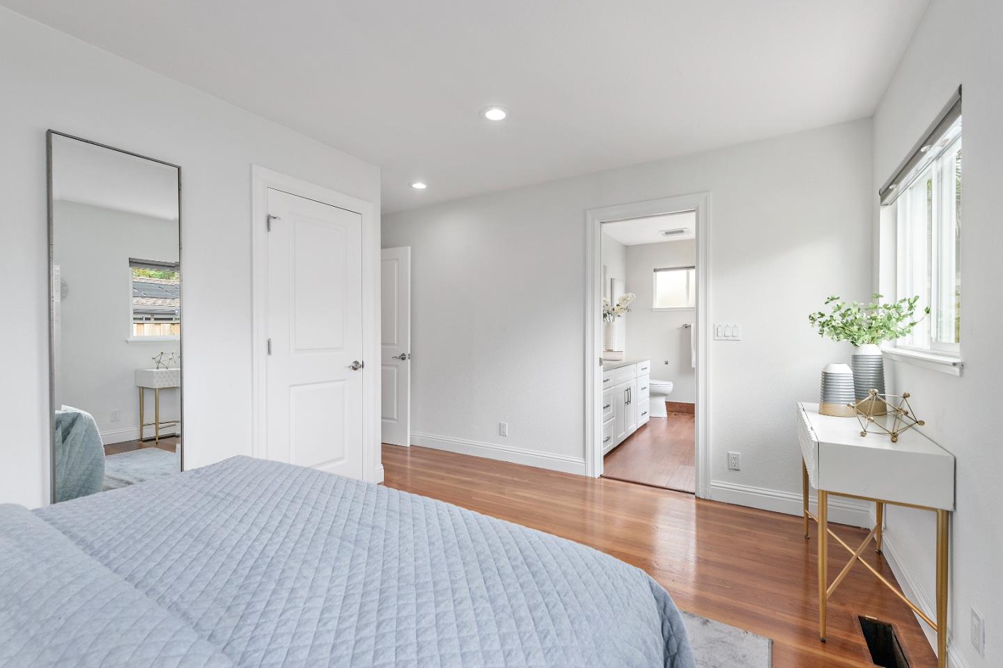 727 Liverpool Way Sunnyvale, CA 94087 - Photo 18 of 26 a spacious bedroom with a bed and a dresser