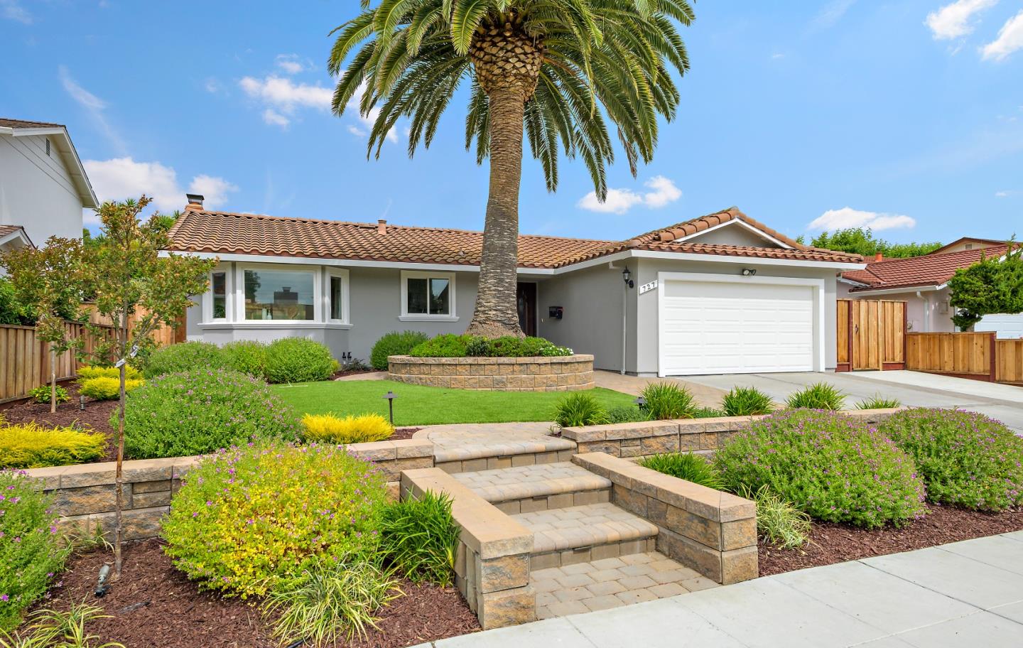 727 Liverpool Way Sunnyvale, CA 94087 - Photo 2 of 26 a front view of a house with a garden