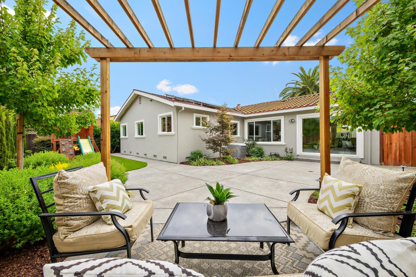 727 Liverpool Way Sunnyvale, CA 94087 - Photo 26 of 26 a view of backyard of house with seating space